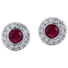H 
H 0.32 Carat Ruby Stud Earrings