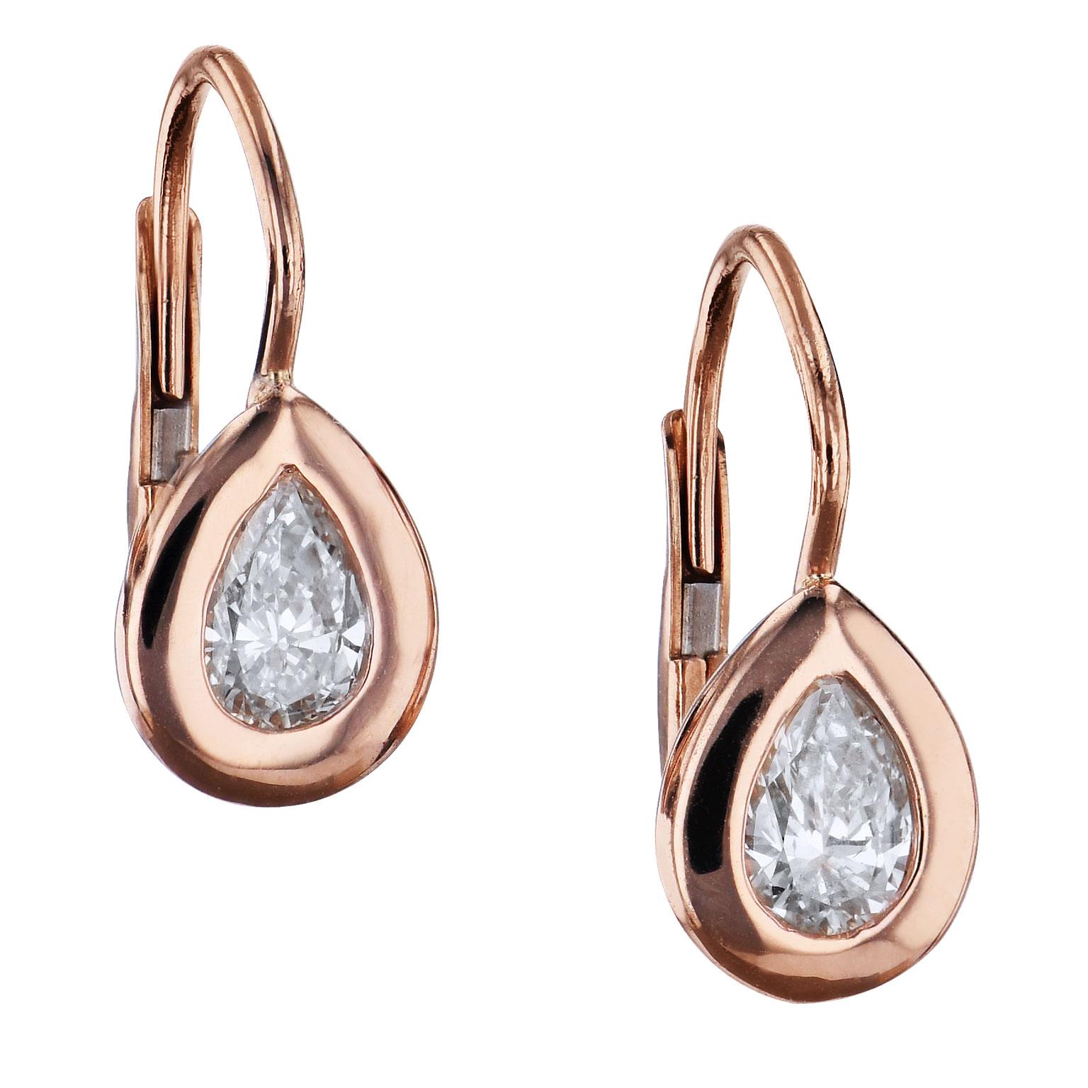 0.57 Carat Pear-Shaped Diamond 18 karat Rose Gold Lever-Back Earrings Handmade

The hardness and strength of diamond merge with the warmth and softness of 18 karat rose gold to create a pair of eye-catching handmade lever-back earrings. Two