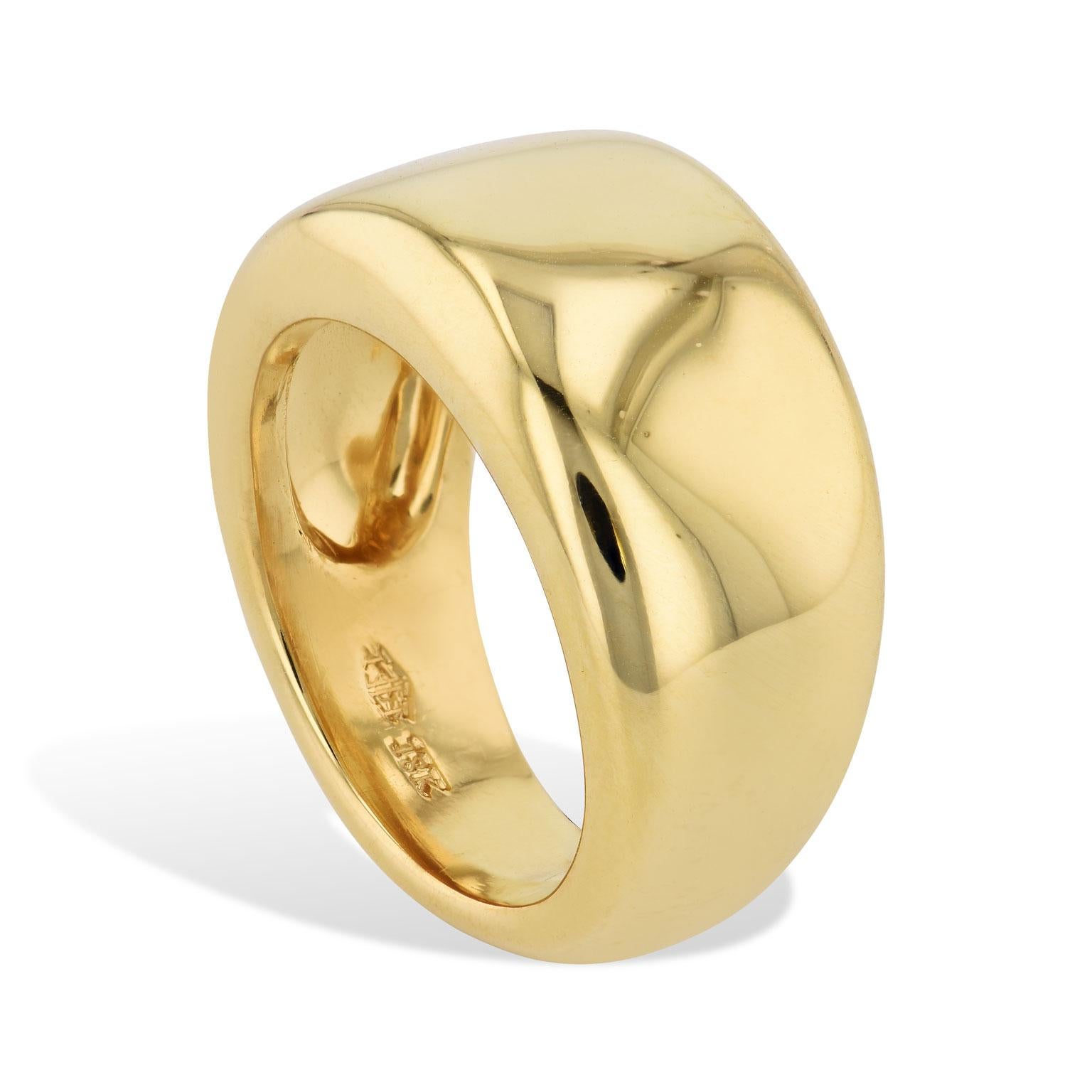 This handmade 18 karat yellow gold band ring is sleek and sumptuous as the smooth contours of the ring hug one’s finger. Enjoy the splendor of yellow gold with this piece.
