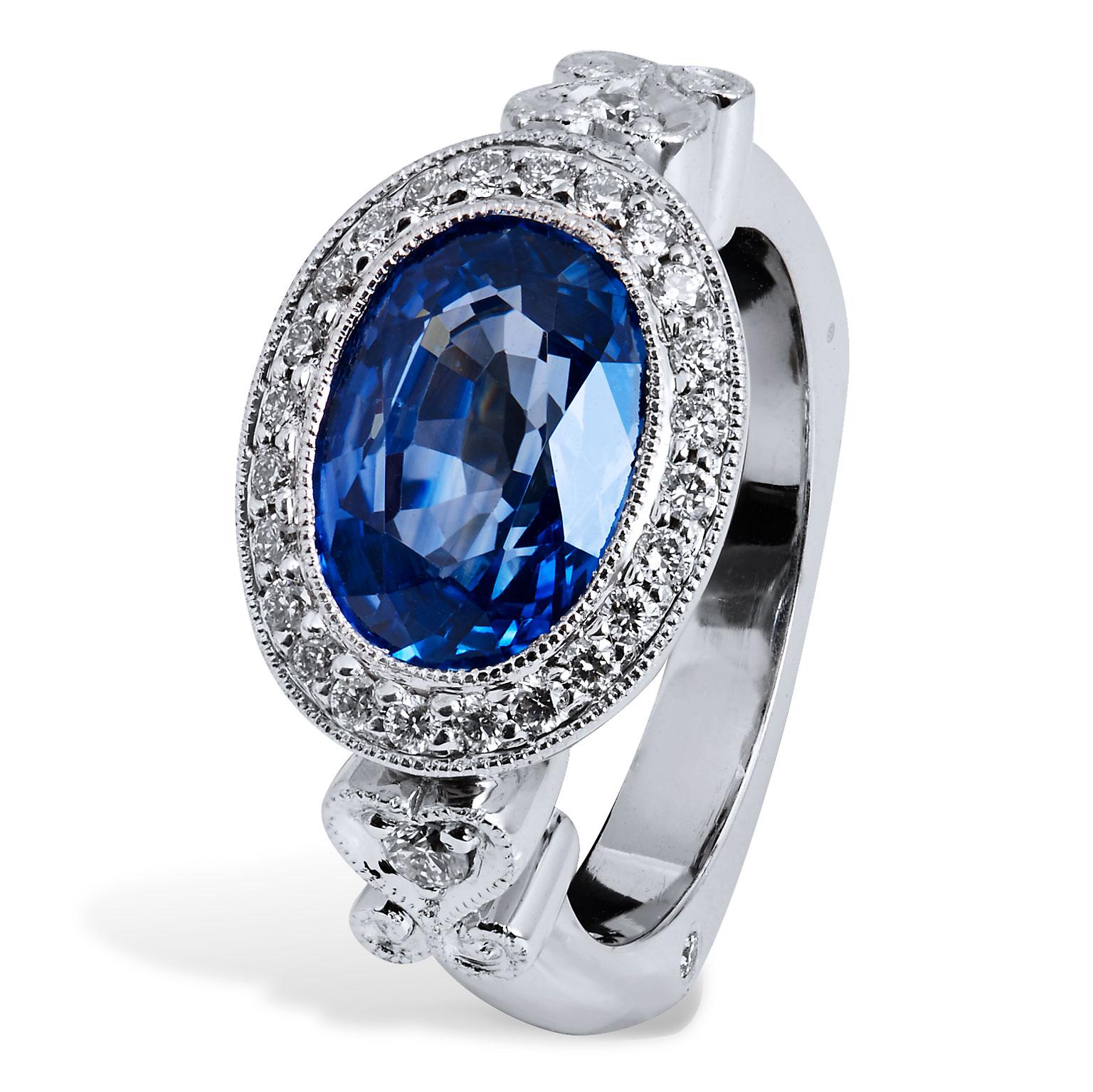 Oval Cut H & H 4.18 Carat Oval Sapphire and Diamond Pave Ring For Sale