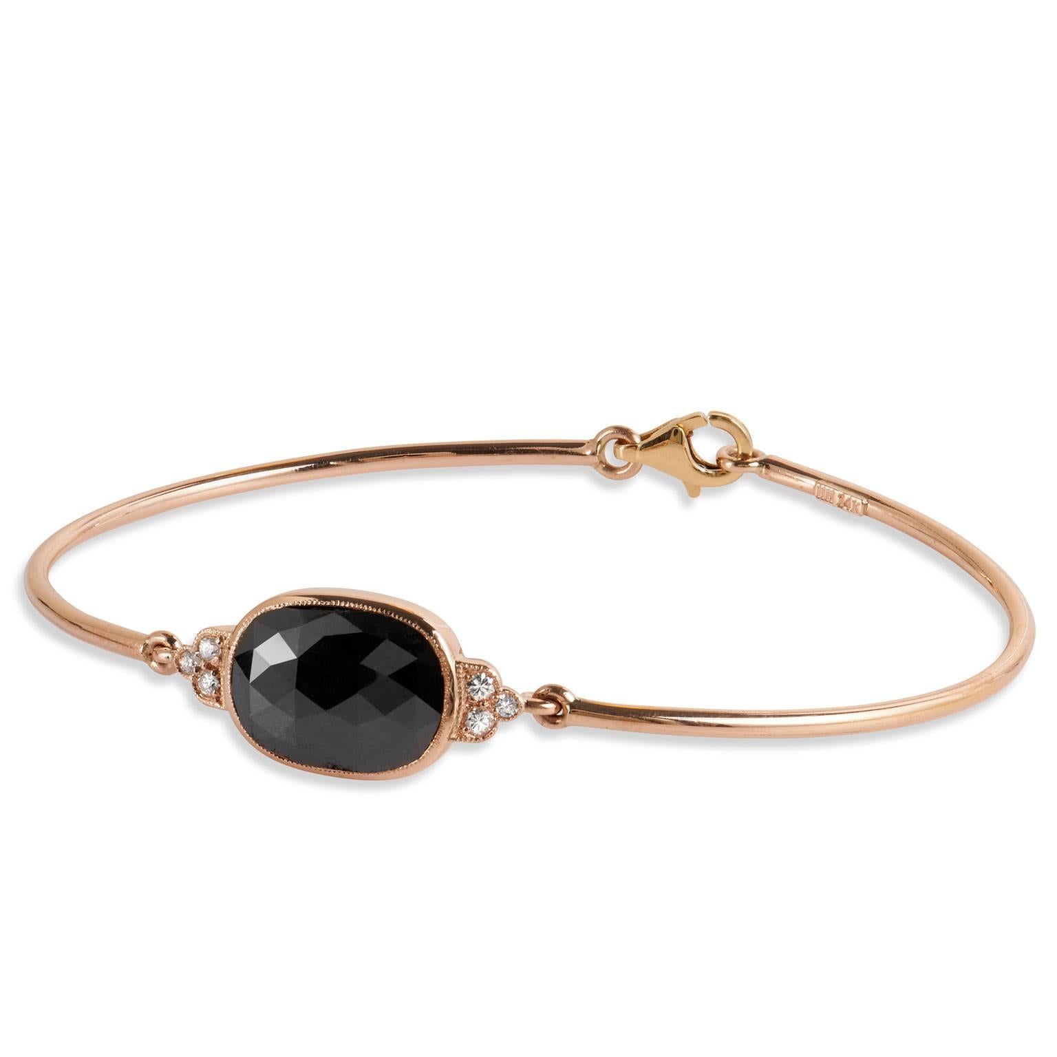 Fall in to the depths of this 6.00 carat rose cut black diamond bracelet. So sweet and elegant, this handmade 14 karat rose gold bracelet features 0.11 carat of pave-set diamond (G/H/VS) in floral motif at each side of the bezel. 