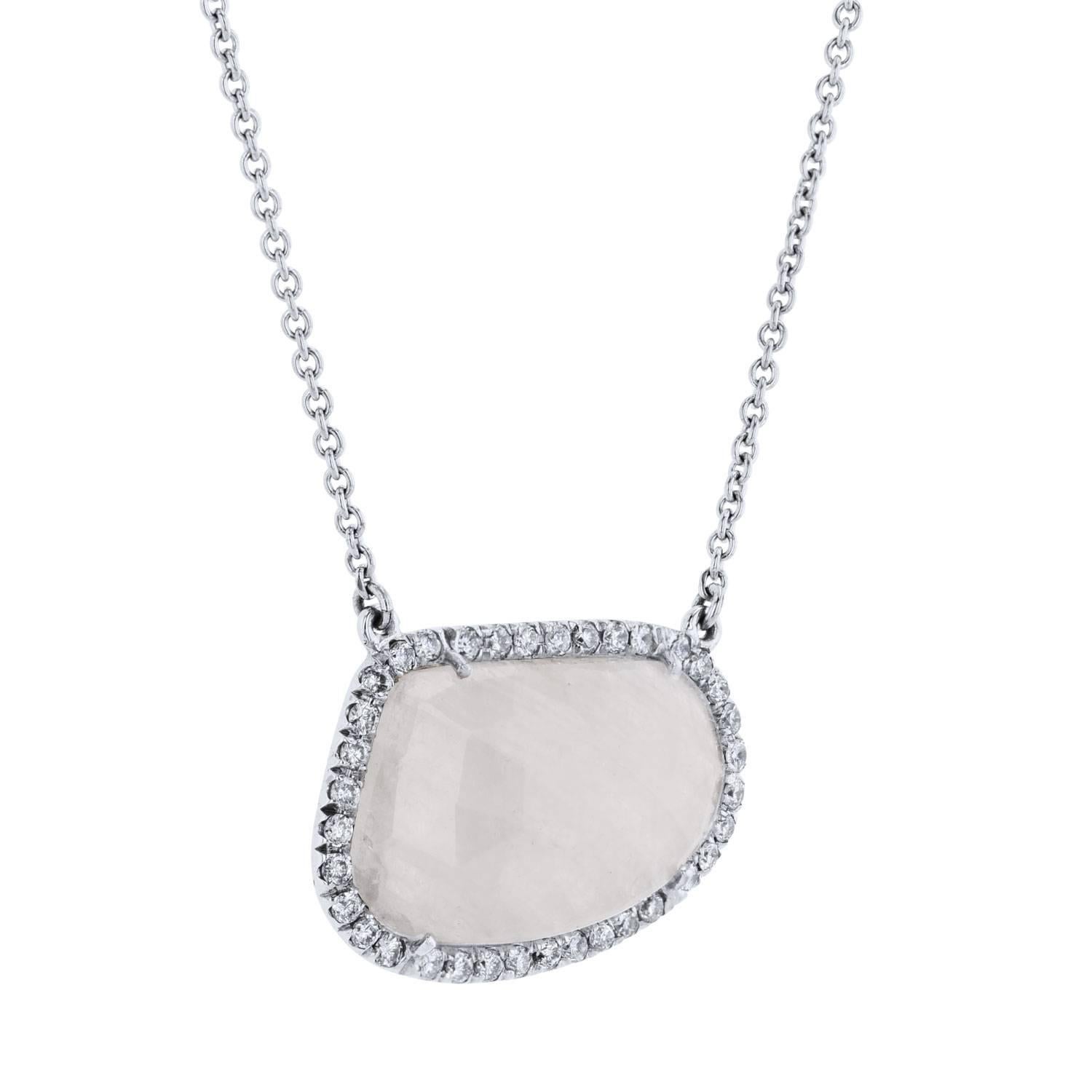 Handmade 9.99 Carat White Sapphire Slice Pendant Necklace 18 karat White Gold

9.99 Carat White Sapphire Slice with Diamond Halo Pendant  Necklace 18 karat 

An original H&H Jewels design, this one-of-a-kind, handcrafted 18 karat white gold pendant