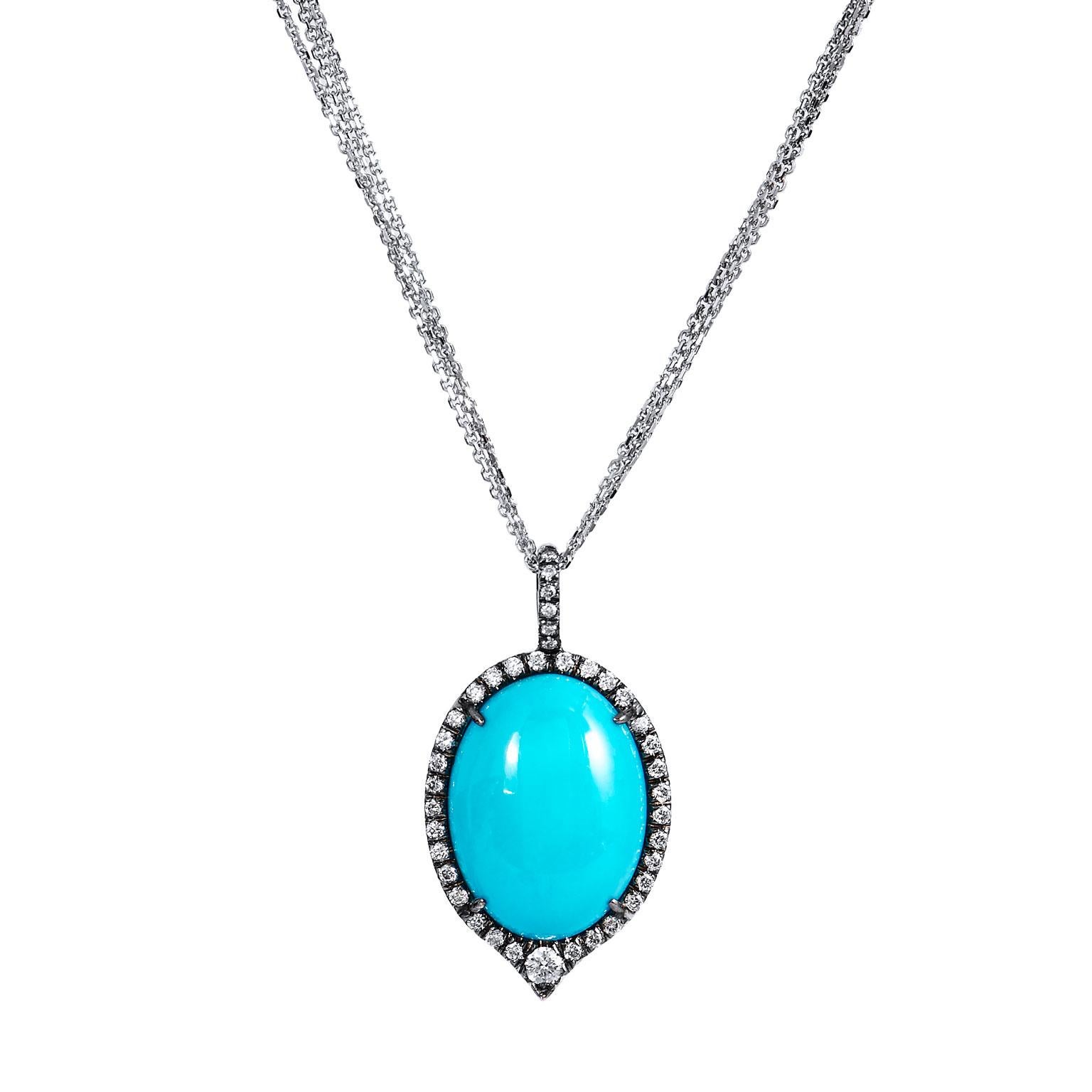 H&H Handmade Turquoise White Gold Diamond Pendant Necklace

A striking 16 millimeter by 12 millimeter turquoise is set at center and fashioned in 18 karat white gold in this handcrafted H&H pendant. Turquoise is a stone of protection- strong and