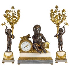 Antique H. Luppen & Cie, Bronze and Marble Three-Piece Mantel Clock Set