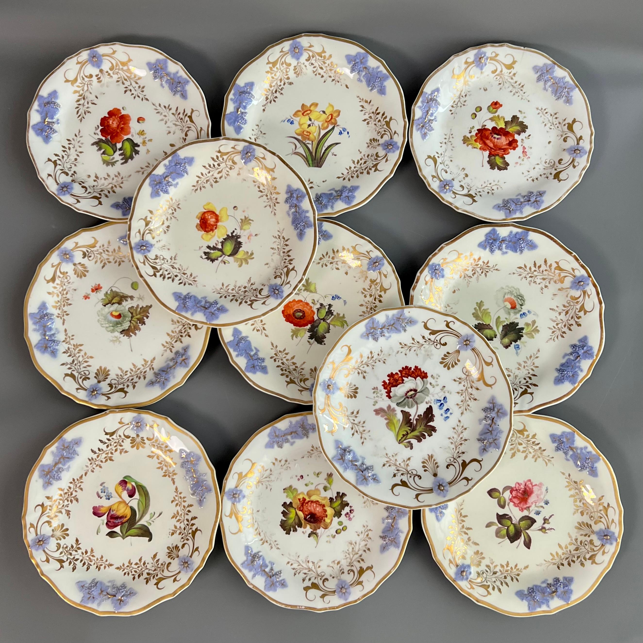 This is a stunning dessert service made by H&R Daniel in 1824. The set consists of a large centre piece comport, two sauce comports (without covers), four large rectangular dishes, four shell dishes, one smaller rectangular dish and eleven plates.