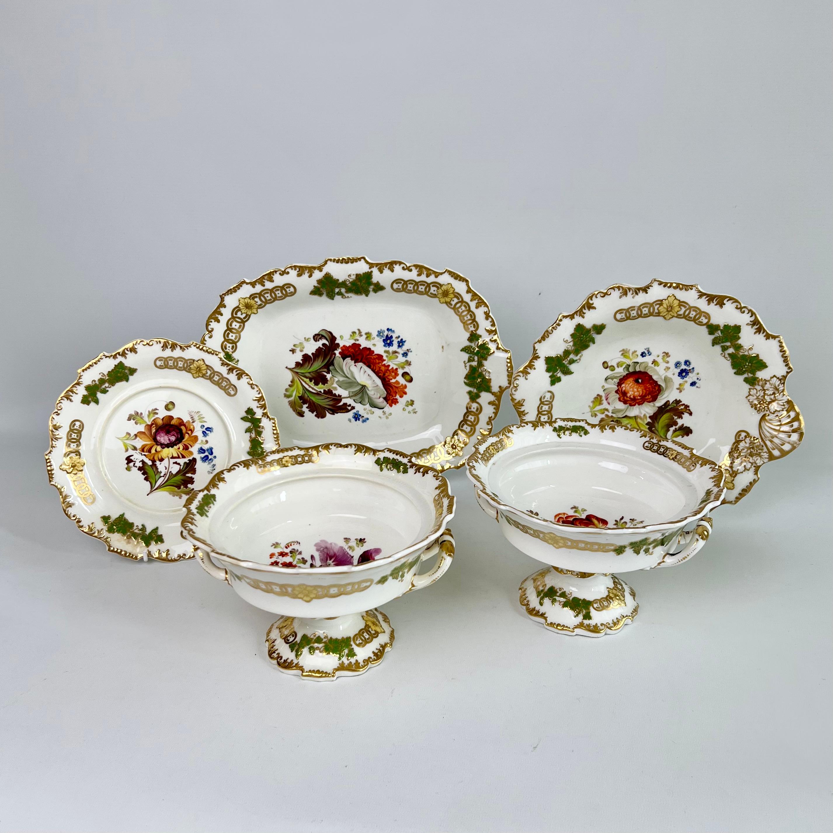 This is a stunning pair of sauce tureens made by H&R Daniel in aboutn 1827. The tureens are made in the popular Shrewsbury shape and have beautiful flower paintings inside the bowls. The tureens are missing their covers and stands, but we have