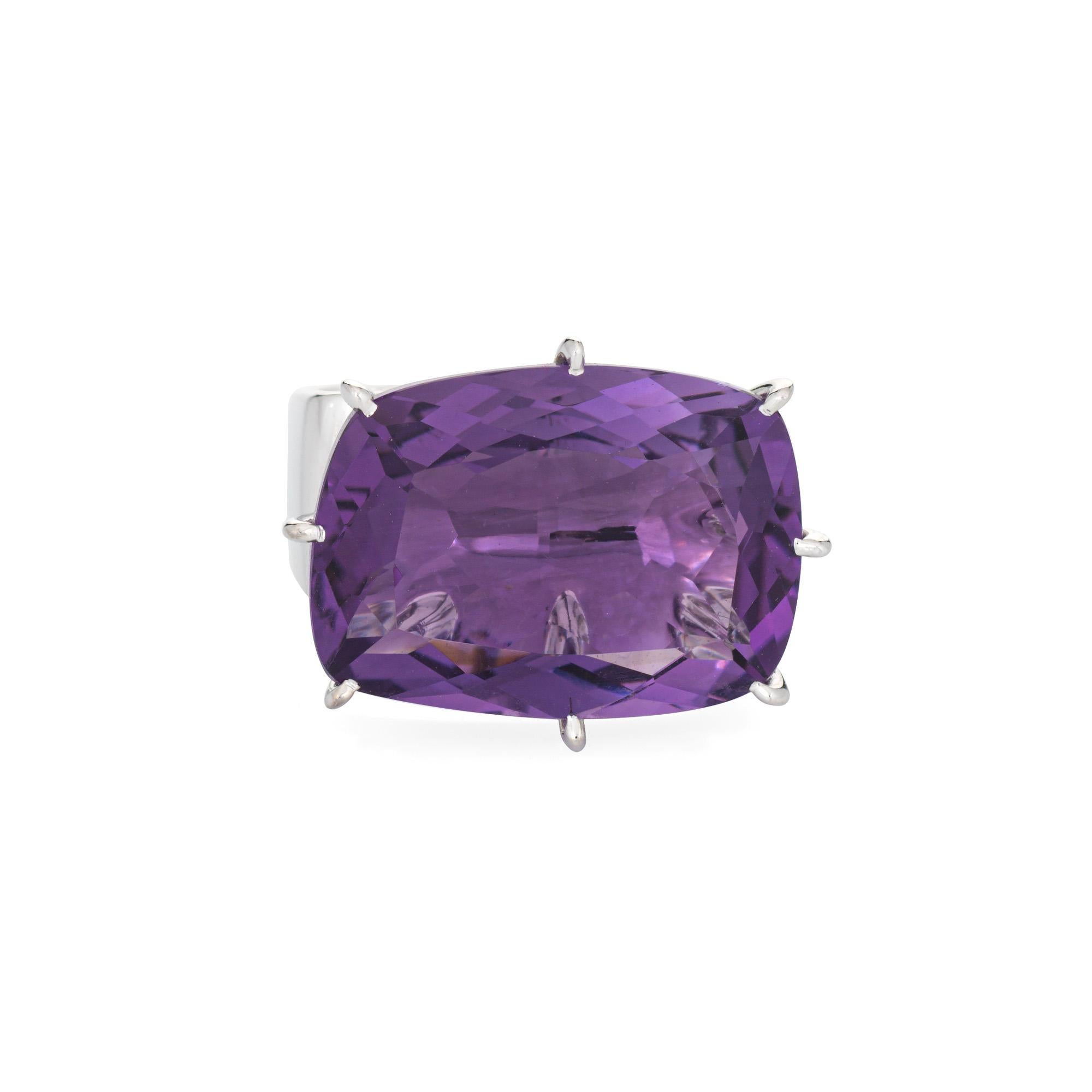 Stylish H Stern Amethyst & diamond ring crafted in 18 karat white gold. 

Cushion cut amethyst is estimated at 10.50 carats. The amethyst is in excellent condition and free of cracks or chips. One estimated 0.03 carat princess cut diamond is set to