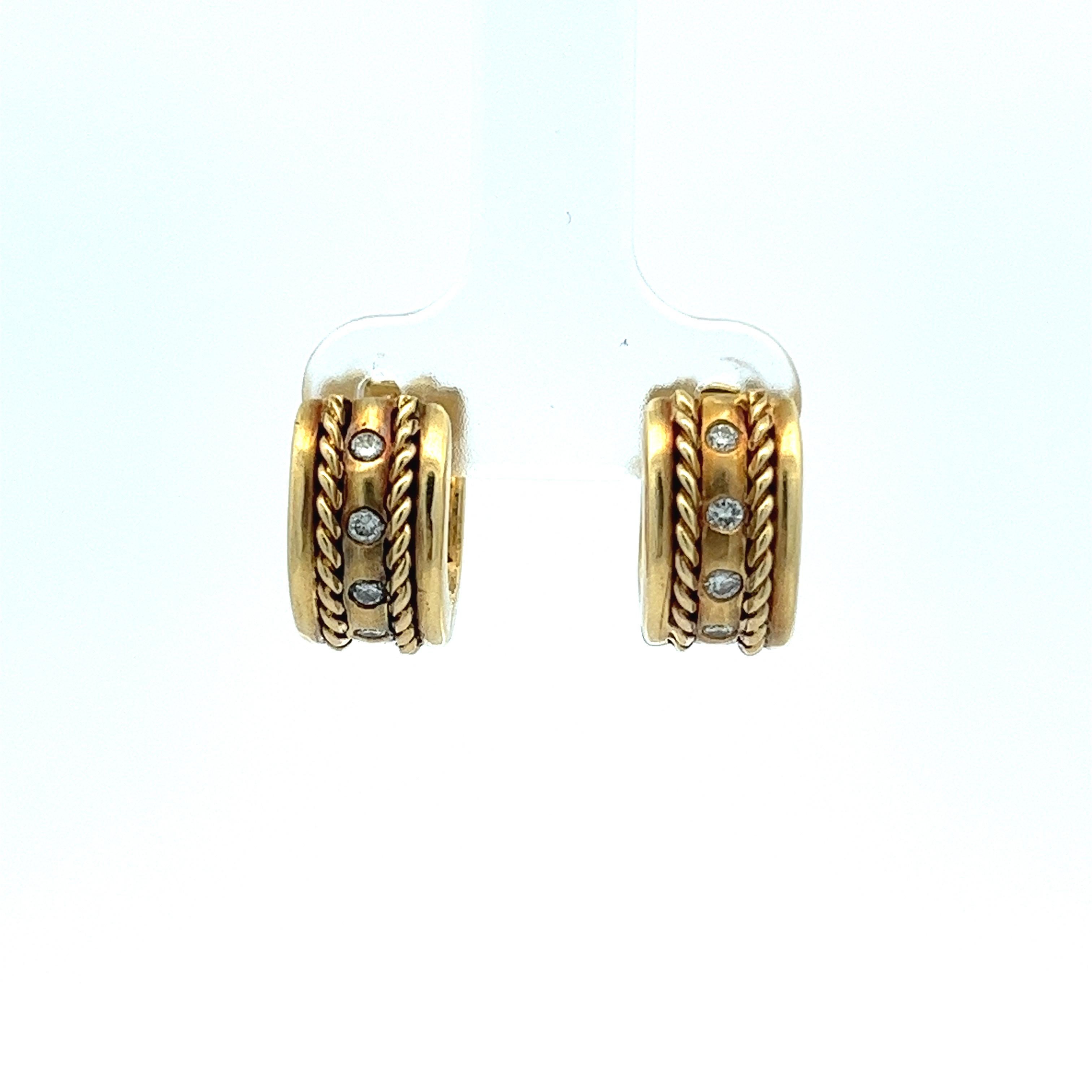 H. Stern's signature hoop huggie earrings are expertly crafted from 18-karat yellow gold. Each earring boasts four diamonds, beautifully highlighted by a refined roped motif. They carry a combined weight of 0.15 carats. Distinctively, the interior