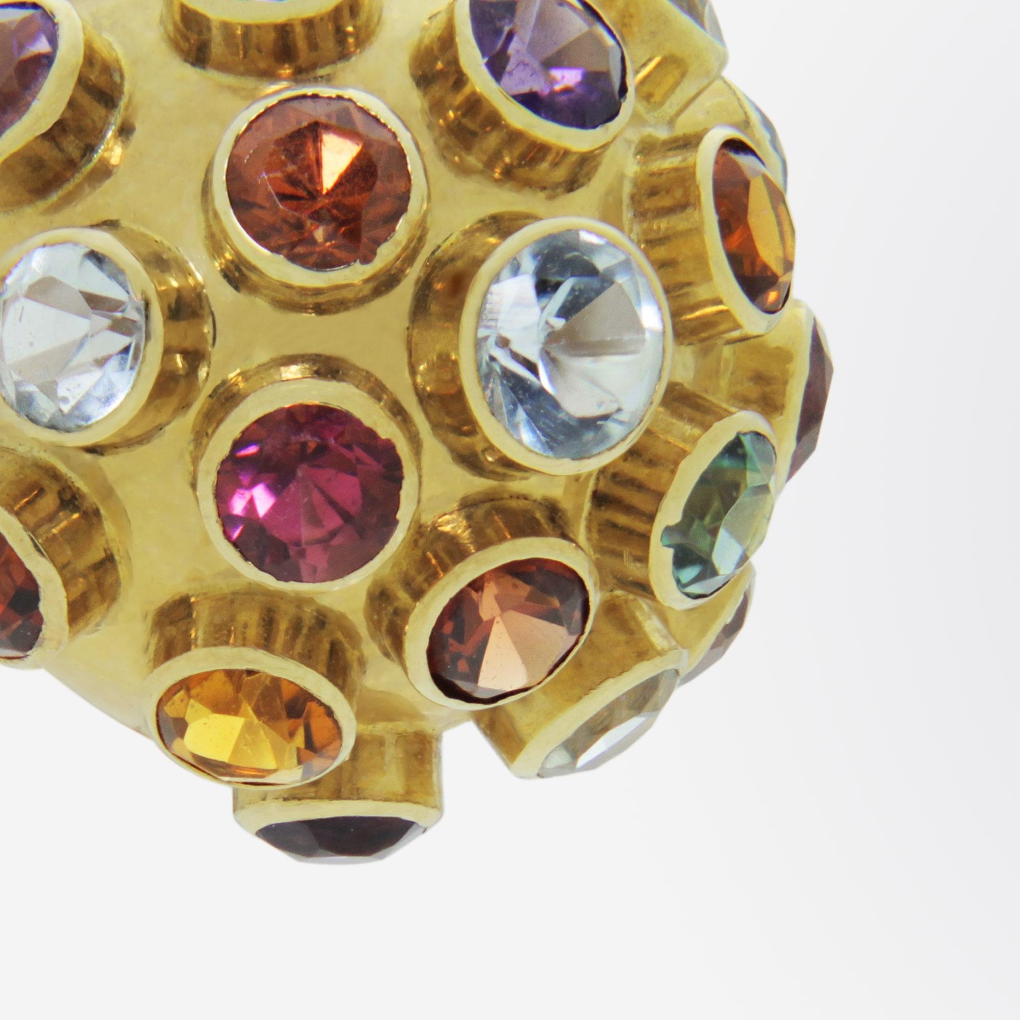 A fine pair of 18 karat yellow gold semi precious stone sputnik style earrings. This particular style is a early design by famed German Brazilian designer Hans Stern (H.Stern) from the 1950s. The pair are set with 38 semi precious stones which