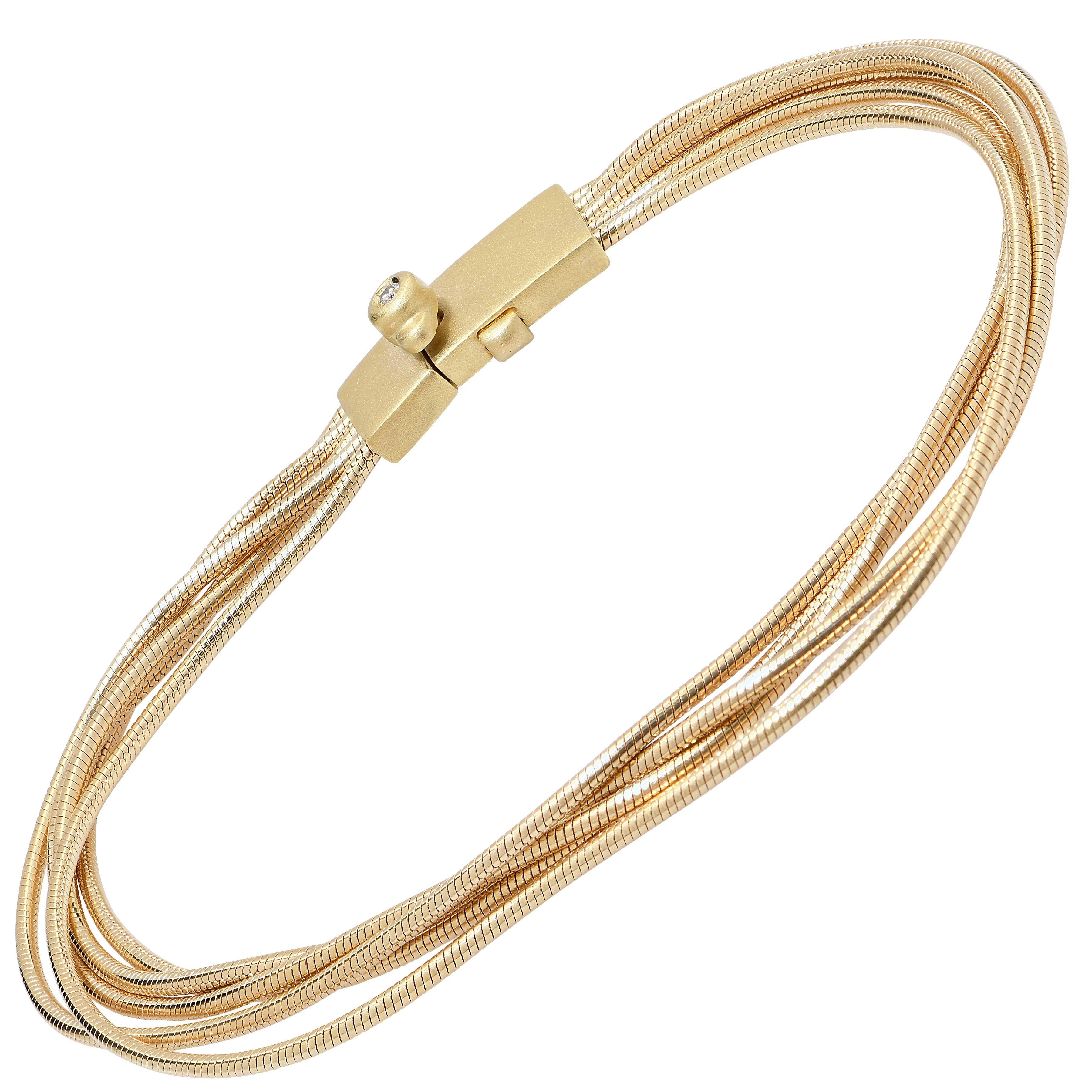 H. Stern 18 Karat Yellow Gold Four Strand Bracelet.
Bracelet Length: 7 Inches
Metal Type: 18 Karat Yellow Gold
Metal Weight: 16.9 Grams