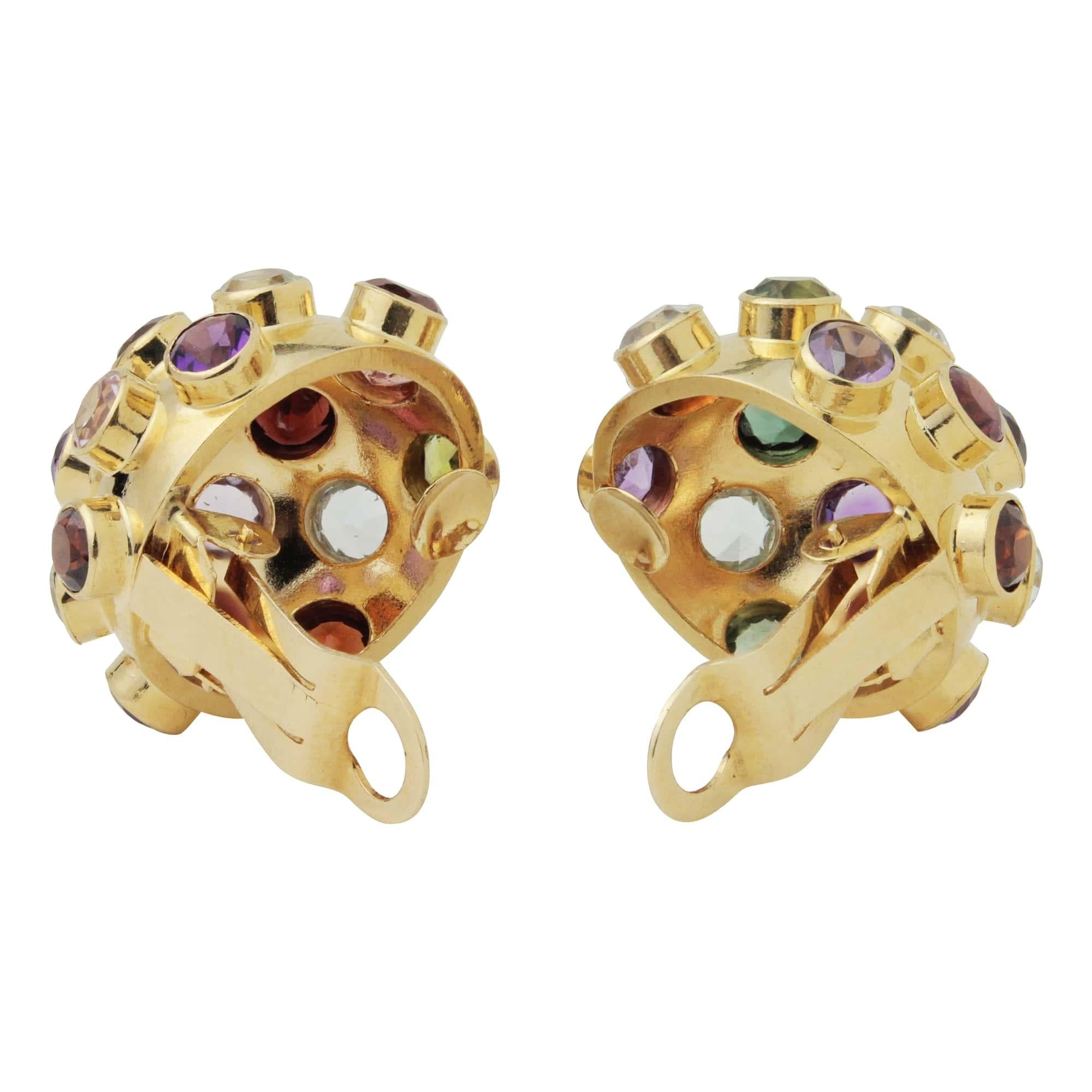Who doesn't love H Stern jewellery? This Brazilian jewellery designer has such iconic styles - recognizable and so collectible. This fabulous pair of Sputnik clip on earrings features a multitude of natural gemstones - aquamarine, garnets,