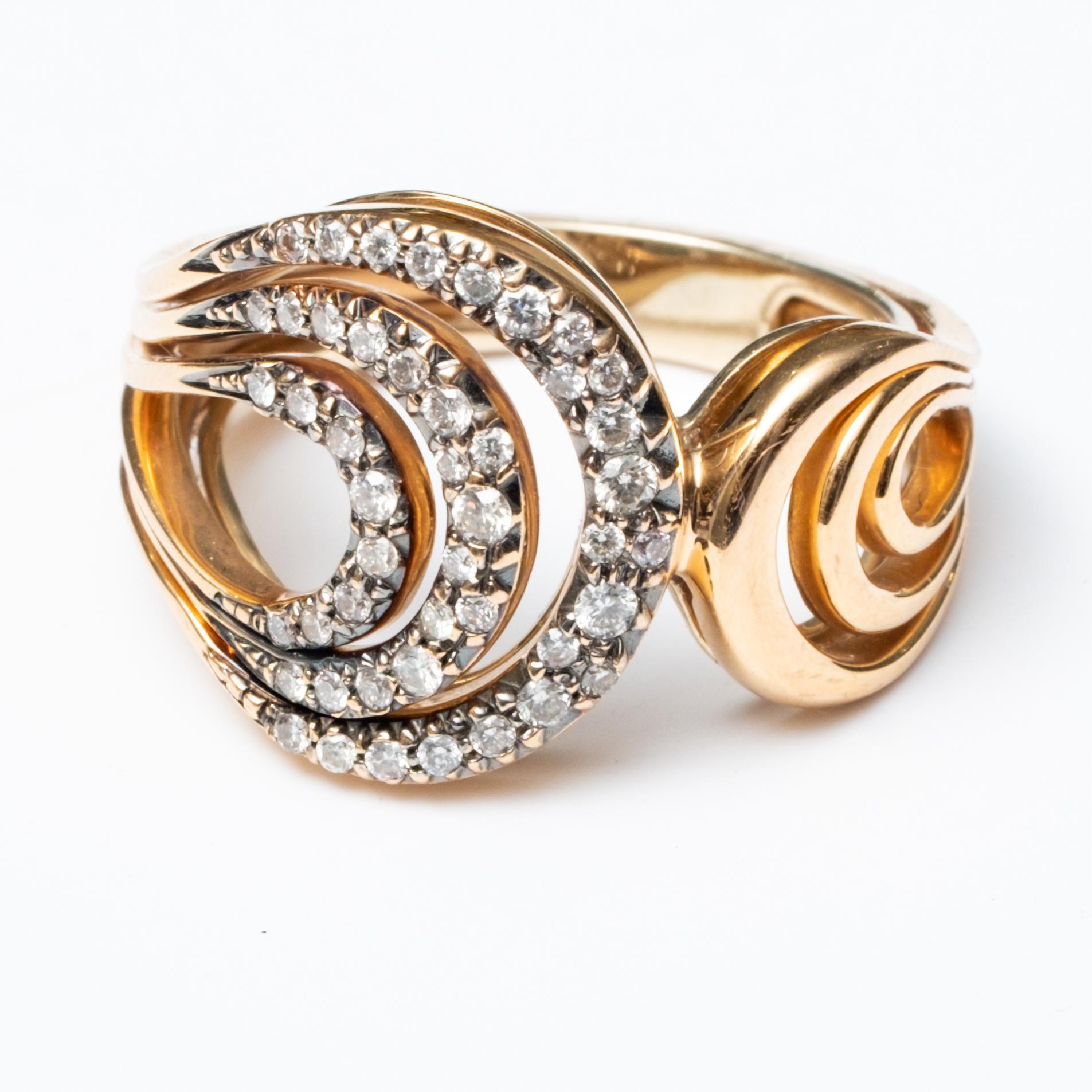 H. Stern 18K Rose Gold and Diamond Ring. This ring is part of the Iris collection. It is set with round diamonds in a swirl pattern. The ring is a size 7.5 and weighs 9.1 grams. 23 diamonds and approx total .65 cw in diamonds. signed and in good