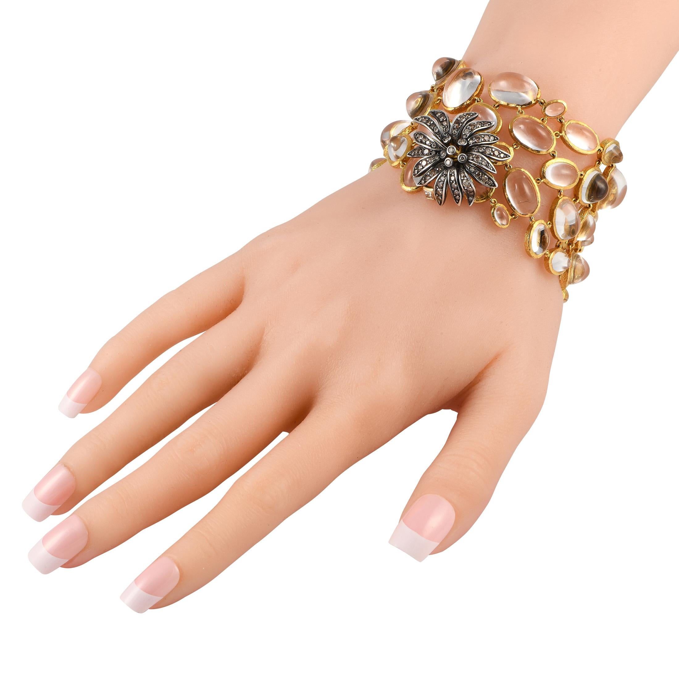Make a scintillating statement by adding this H. Stern bracelet to any ensemble. This bold, breathtaking accessory measures 7.5 long and includes an intricate 18K Yellow Gold setting. Diamonds totaling 1.0 carats elevate the floral motif, while