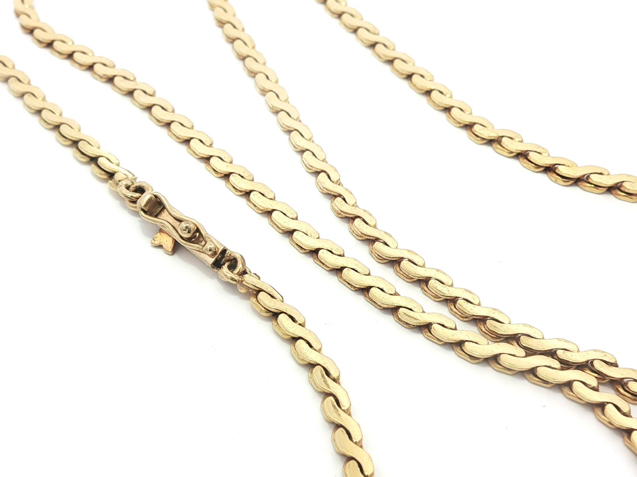 Materiale: Oro giallo massiccio 18k 
Peso: 12,46 grammi
Tipo di catena: A Link 
Lunghezza della catena: 17,0 pollici (misurata accanto al righello)
Larghezza della catena: 2 mm (0,08