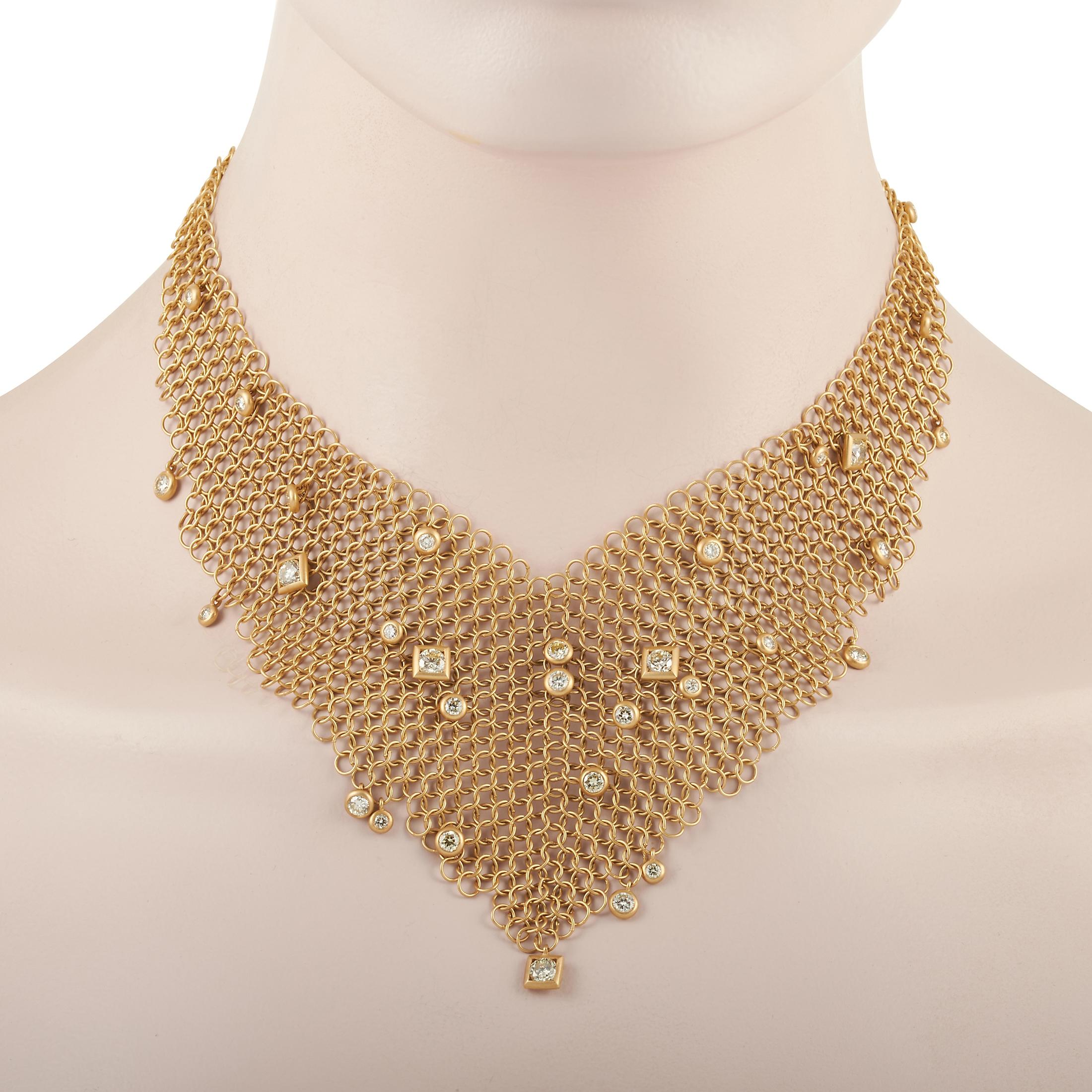 From luxury jewelry brand H. Stern, here is an 18K yellow gold bib necklace that can be a defining piece of your outfit. It exudes an avant-garde style with a hint of romantic flair given its bib-like triangular shape which drops just below the
