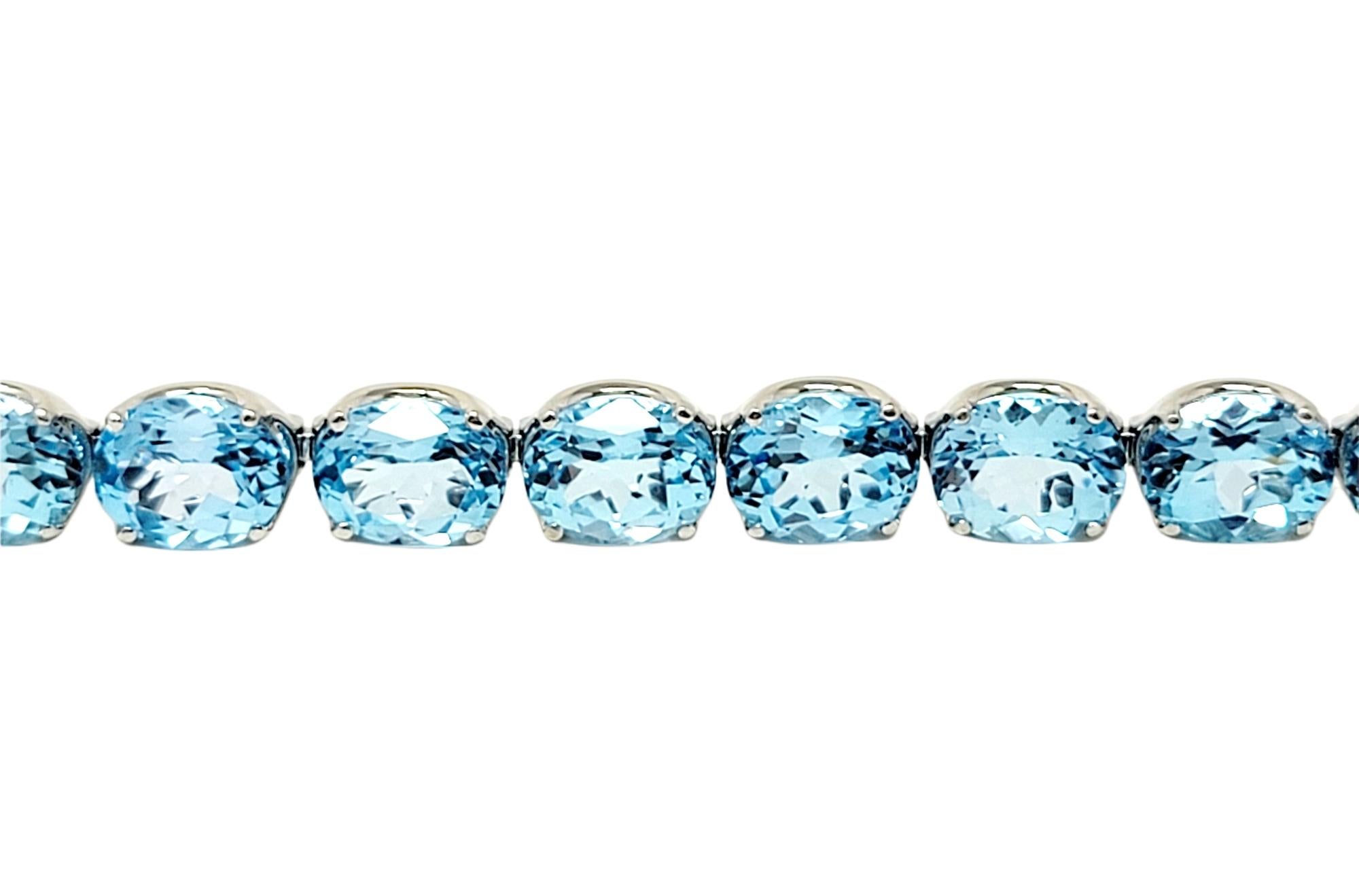 Contemporary H. Stern 58.66 Carat Blue Topaz Line Bracelet with Diamond Star 18 Karat Gold For Sale