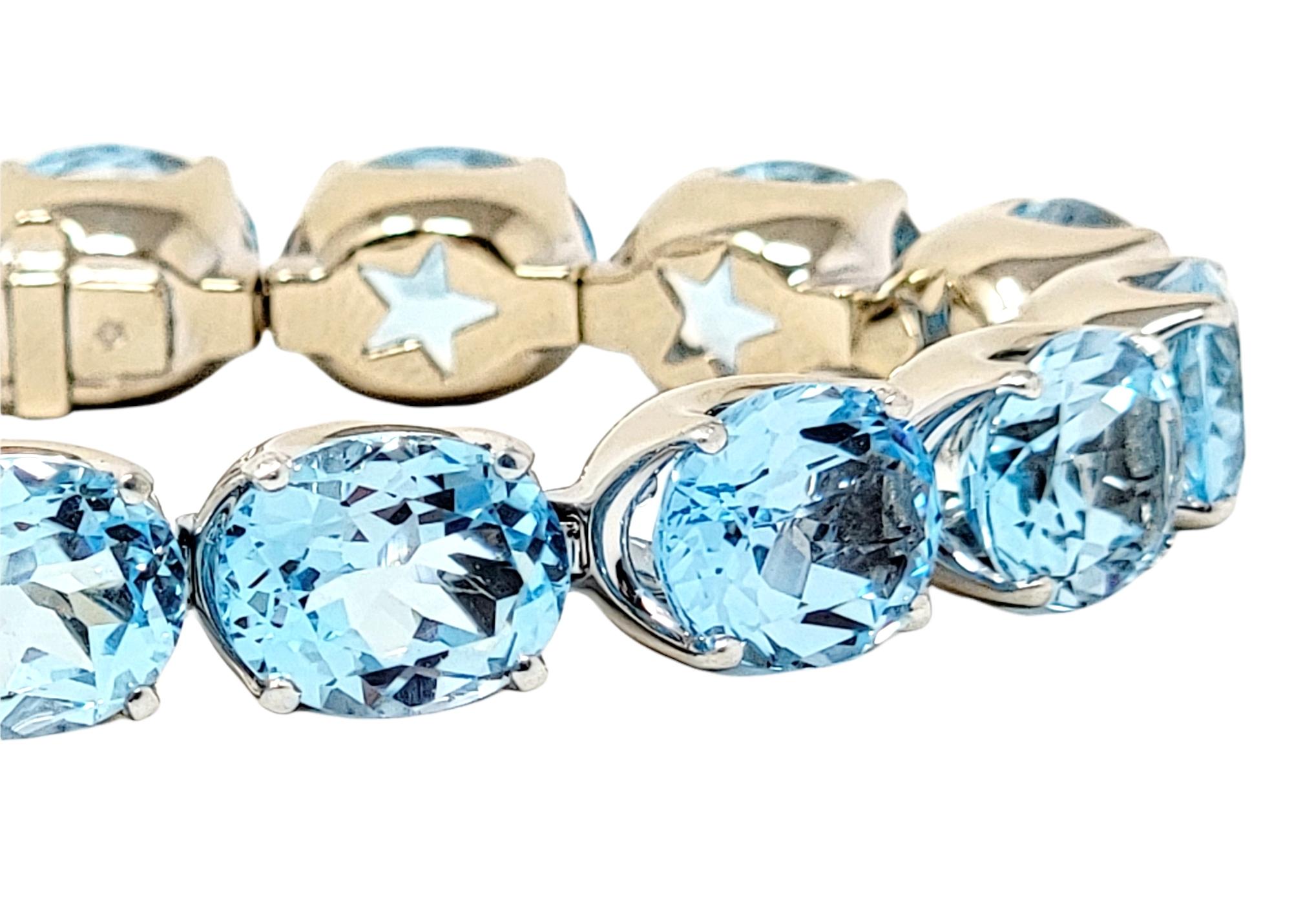 H. Stern 58.66 Carat Blue Topaz Line Bracelet with Diamond Star 18 Karat Gold In Good Condition For Sale In Scottsdale, AZ