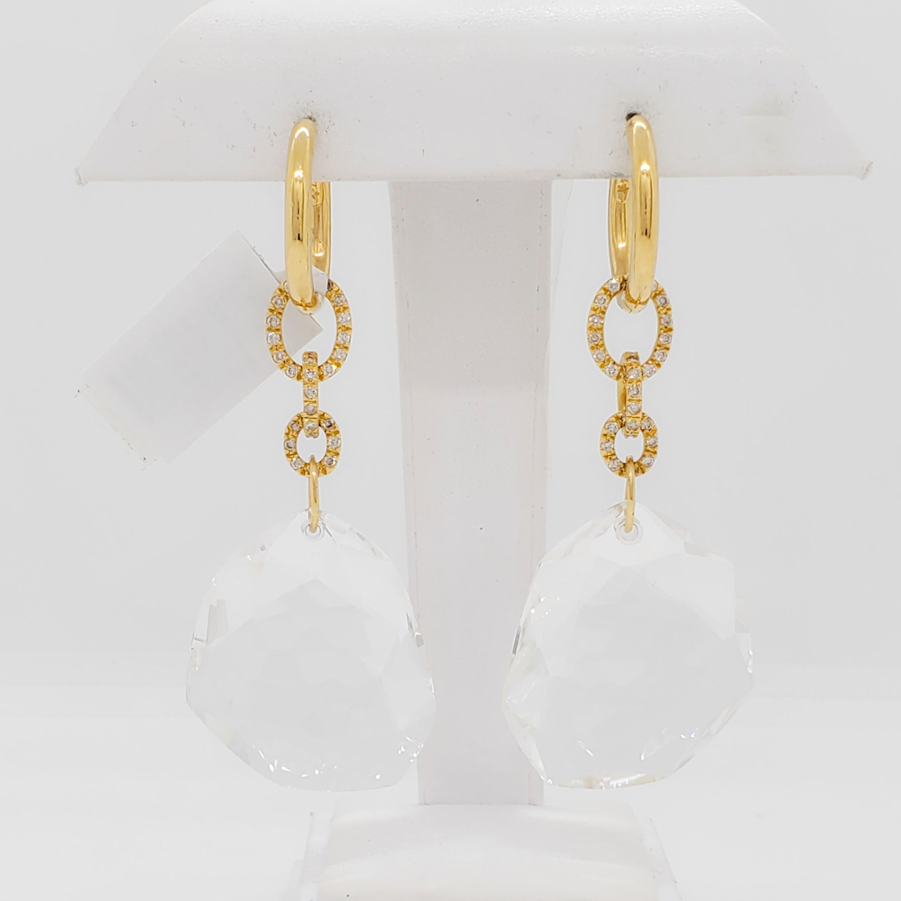 Absolutely gorgeous dangle earrings by H. Stern and famous designer Diane Von Furstenberg.  Featuring large white crystals and good quality white diamond rounds.  Handmade in 18k yellow gold. 