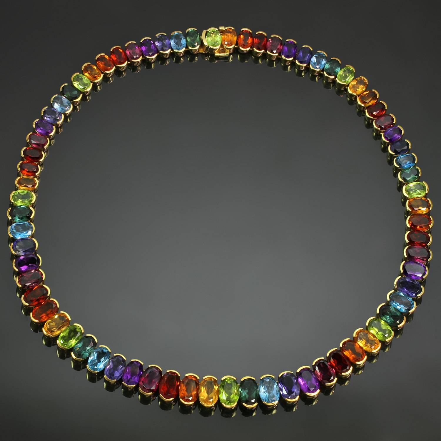 This gorgeous H. Stern necklace from the lively Brazil collection is crafted in 18k yellow gold and features a colorful array of 72 oval half bazel-set gemstones, forming 8 groups of sparkling stones, graduated by weight in the following order from