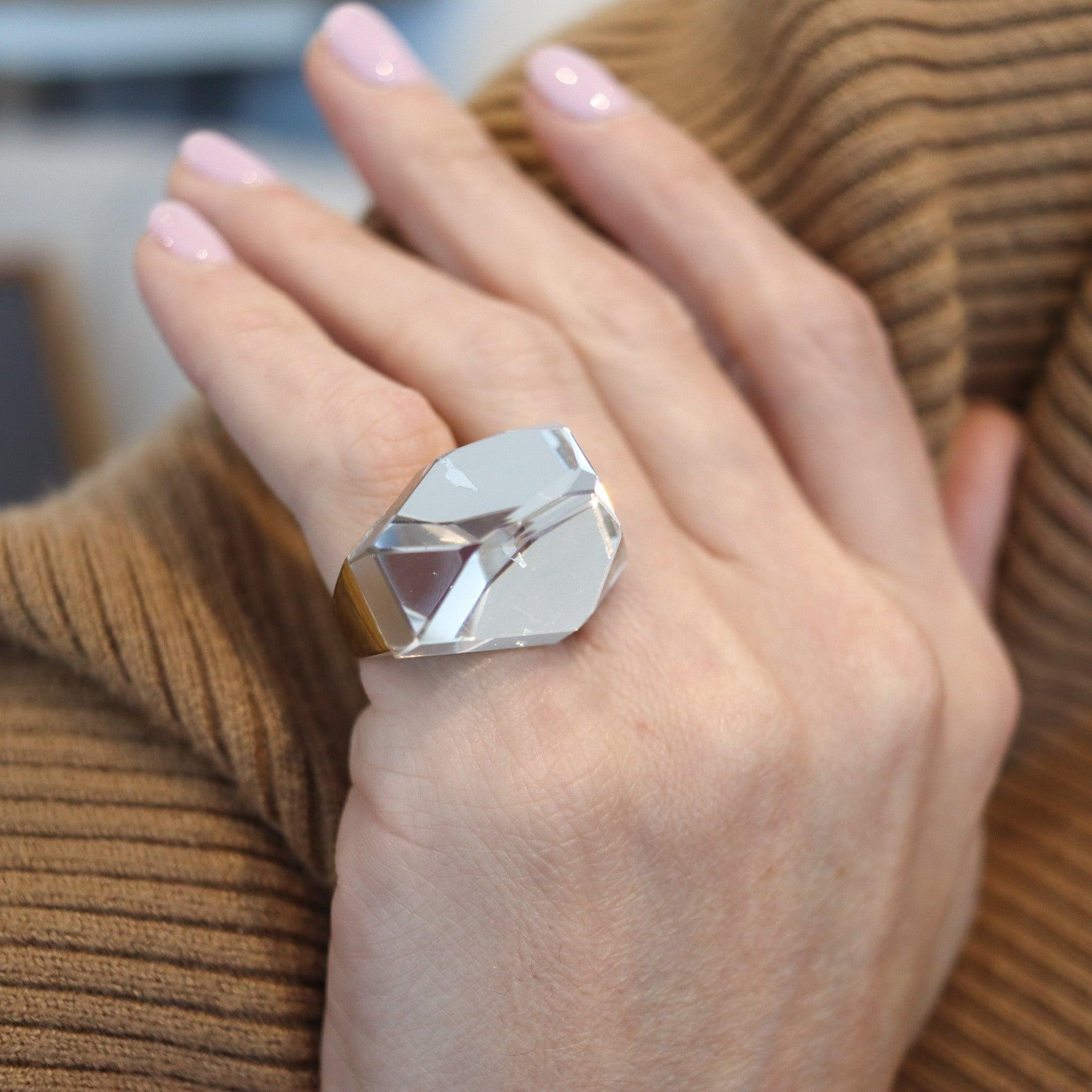 Geometric ring designed by Diane Von Furstenberg for H. Stern.

This is a stunning geometric cocktail ring, created by the Brazilian jewelry house of H. Stern,  back in the 1990. This beautiful contemporary ring is part of the Power-Collection,