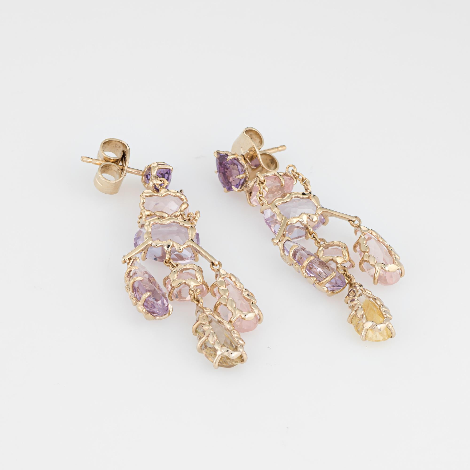 Elegant pair of pre owned H Stern cobblestone earrings, crafted in 18k yellow gold. 

Amethyst, rose quartz and rutilated quartz in various cuts are set into the earrings. The stones are in excellent condition and free of cracks or chips. 

The