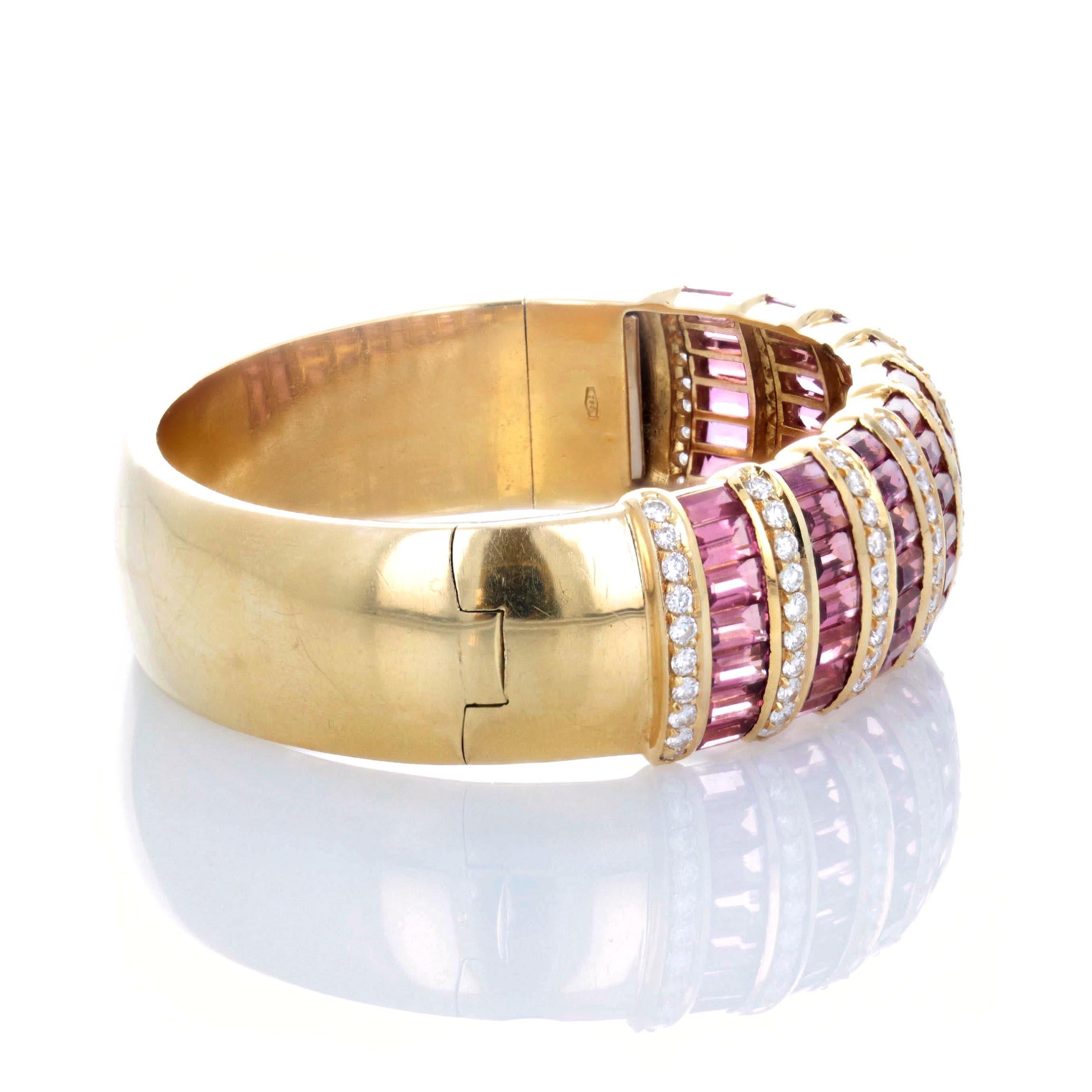 Set with 100 brilliant-cut diamonds weighing 3.26 carats in total and 63 baguette-cut pink tourmalines weighing 20.90 carats. Mounted in 18K yellow gold. Signed. Circa late 1980's.

* More photos by request
* FREE shipping within the continental