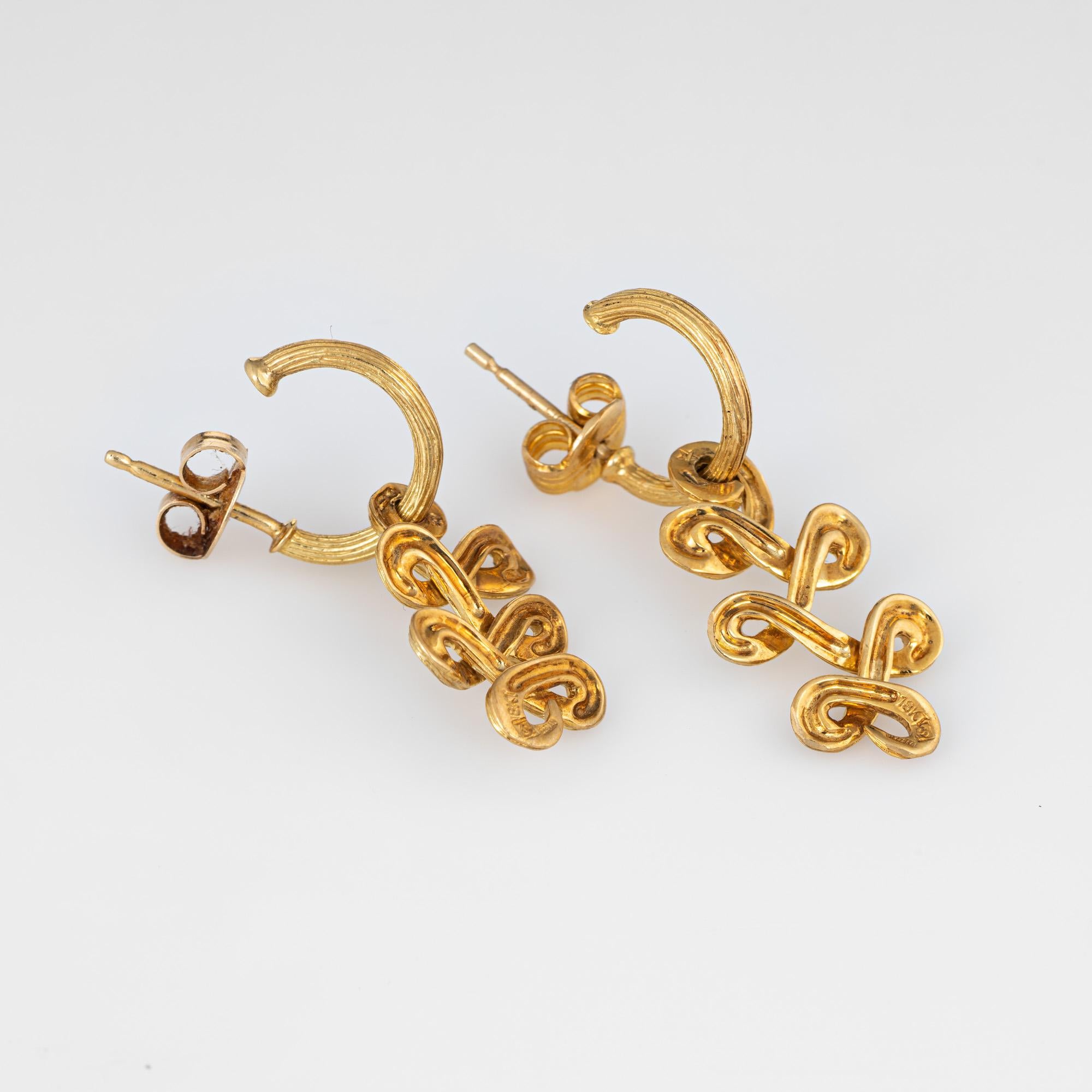 Elegant pair of pre-owned H Stern earrings crafted in 18k yellow gold. 

The elegant earrings feature a cascading ribbon style design. The earrings are fitted with posts & butterfly backings for pierced ears.

The earrings are in excellent original