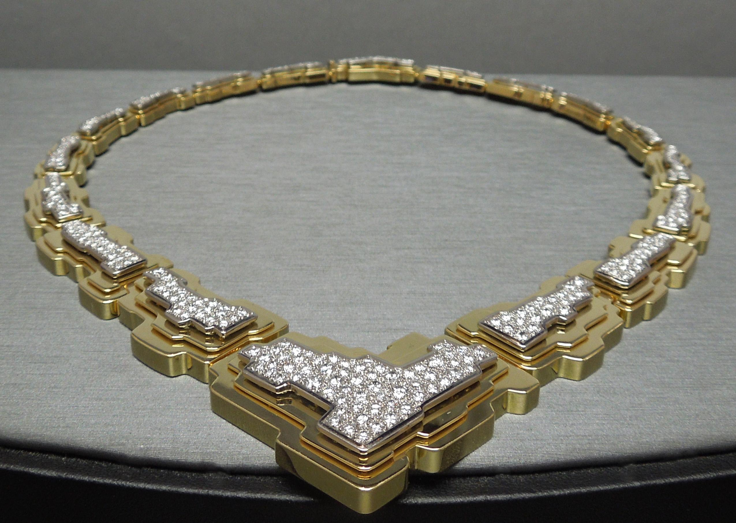 We are thrilled to offer this one of a kind 18 Karat Gold & Brilliant Diamond 3-Piece set hand crafted by Hans Stern. In an asymmetrical, multi-level geometric design encrusted with Pave set Diamonds throughout. 
Set containing a total of 14 carats