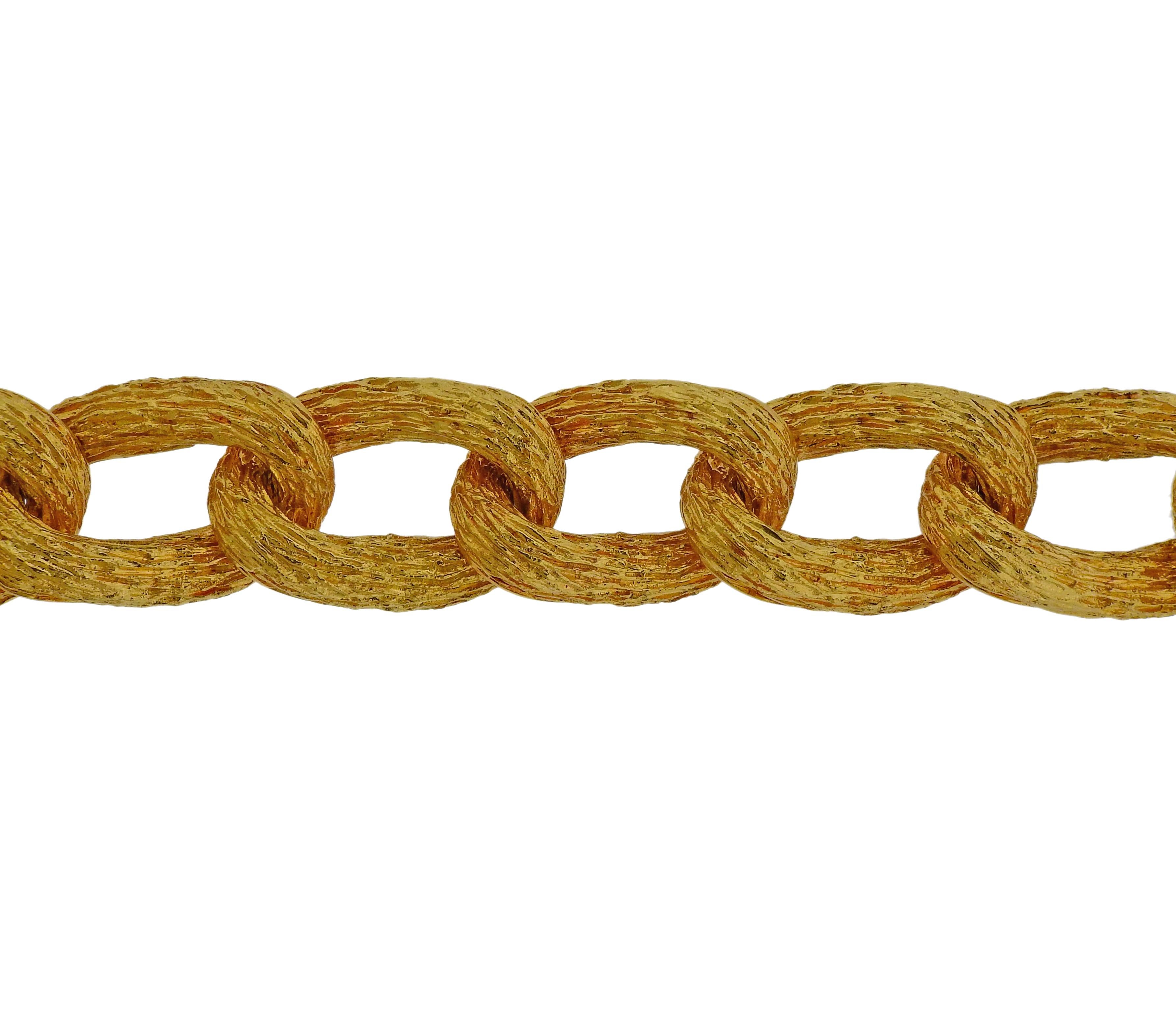 18k textured gold link bracelet by H. Stern. Bracelet measures  8