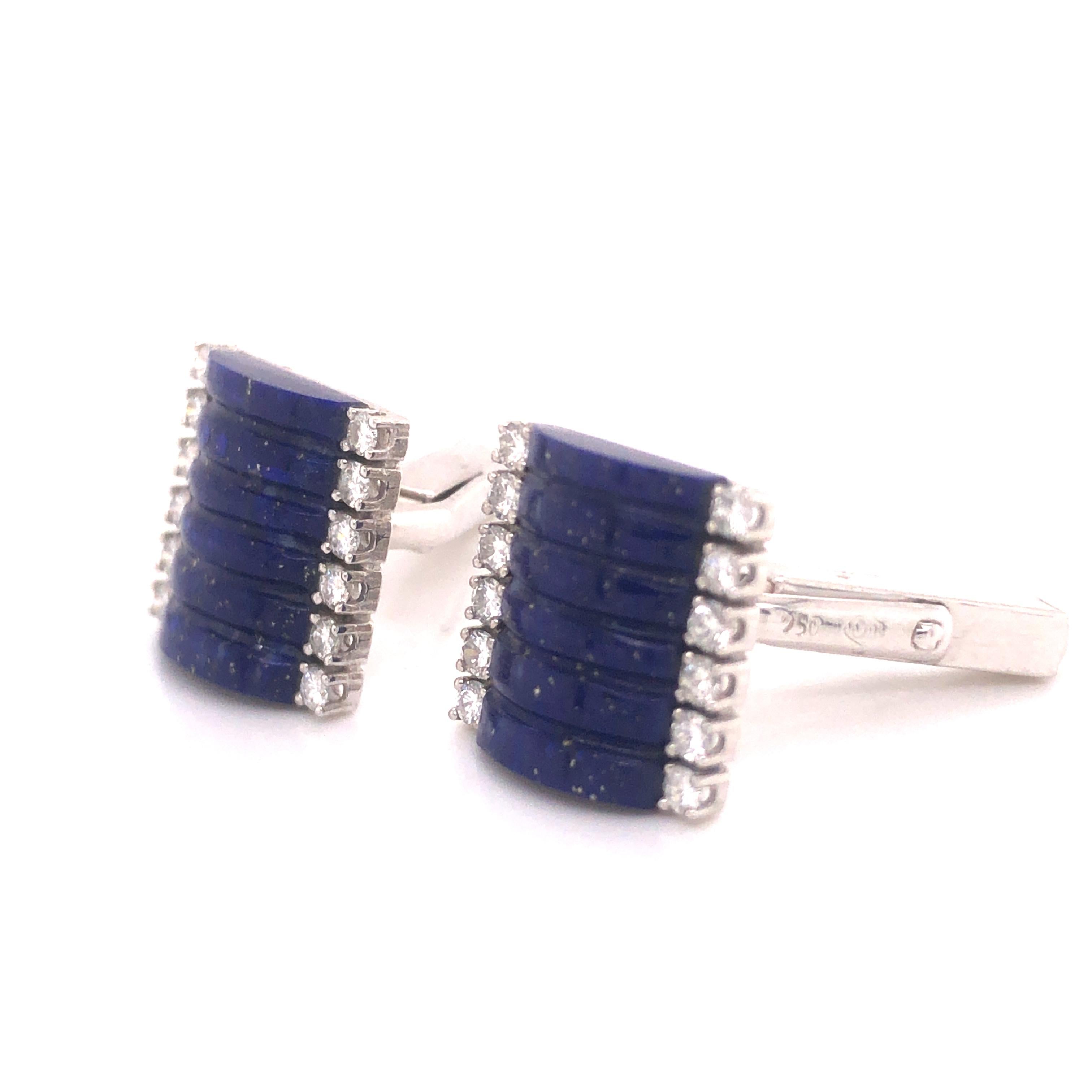 AmazIng design of this one of a kind pair of mens cufflinks. Crafted by famed designer H. Stern. Highlighting this  pair are carved lapis lazuli gemstones. The blue color is electric, accenting the lapis are round brilliant cut natural diamonds. 