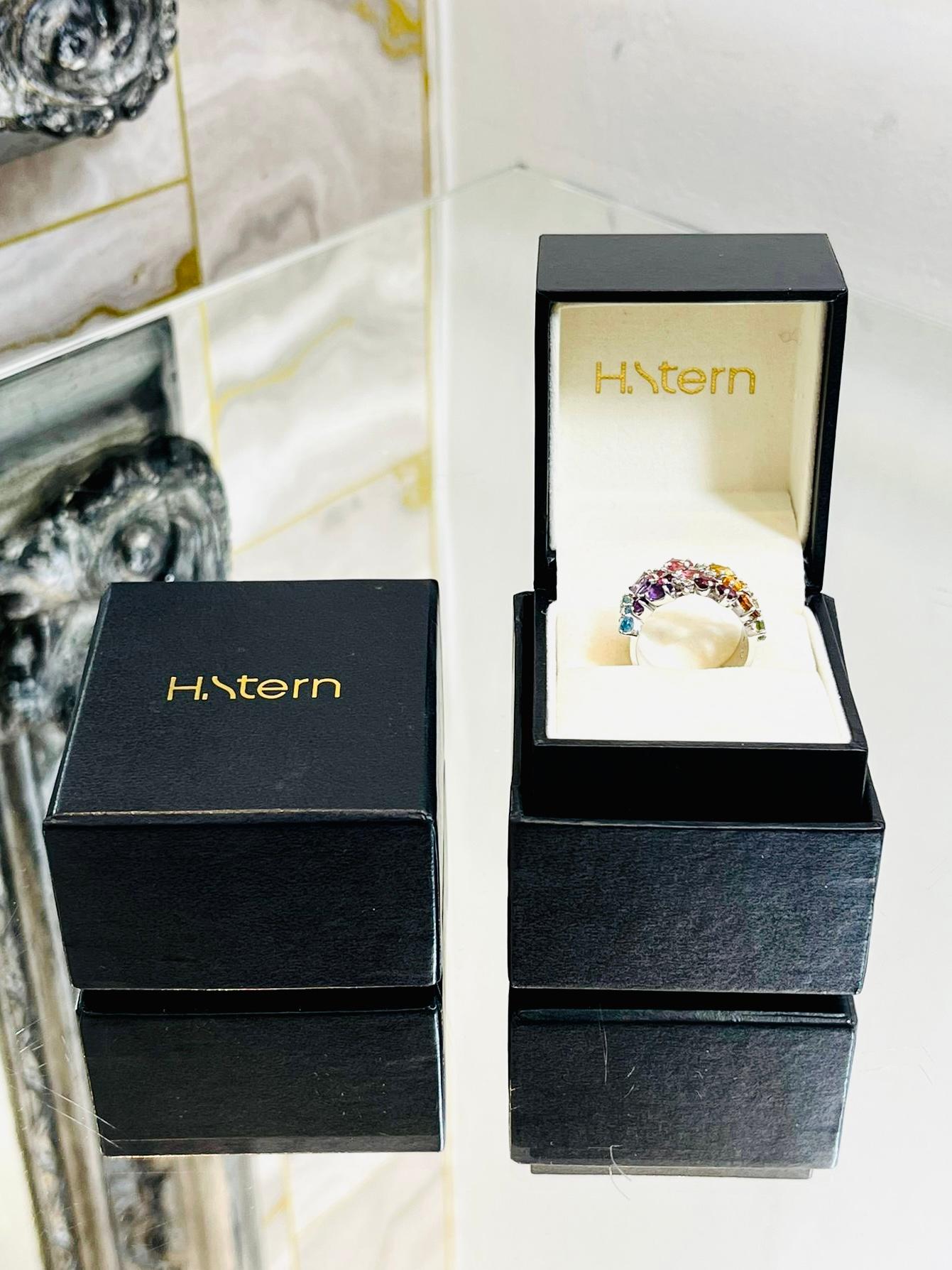 H Stern Rainbow Gemstone Ring In 18k White Gold 

Multi-coloured gemstones and diamonds, claw set in an array of 

different stone cuts and shapes on a white gold band.

Size - 54EU

Condition - Very Good (Light scratches to the shank)

Composition