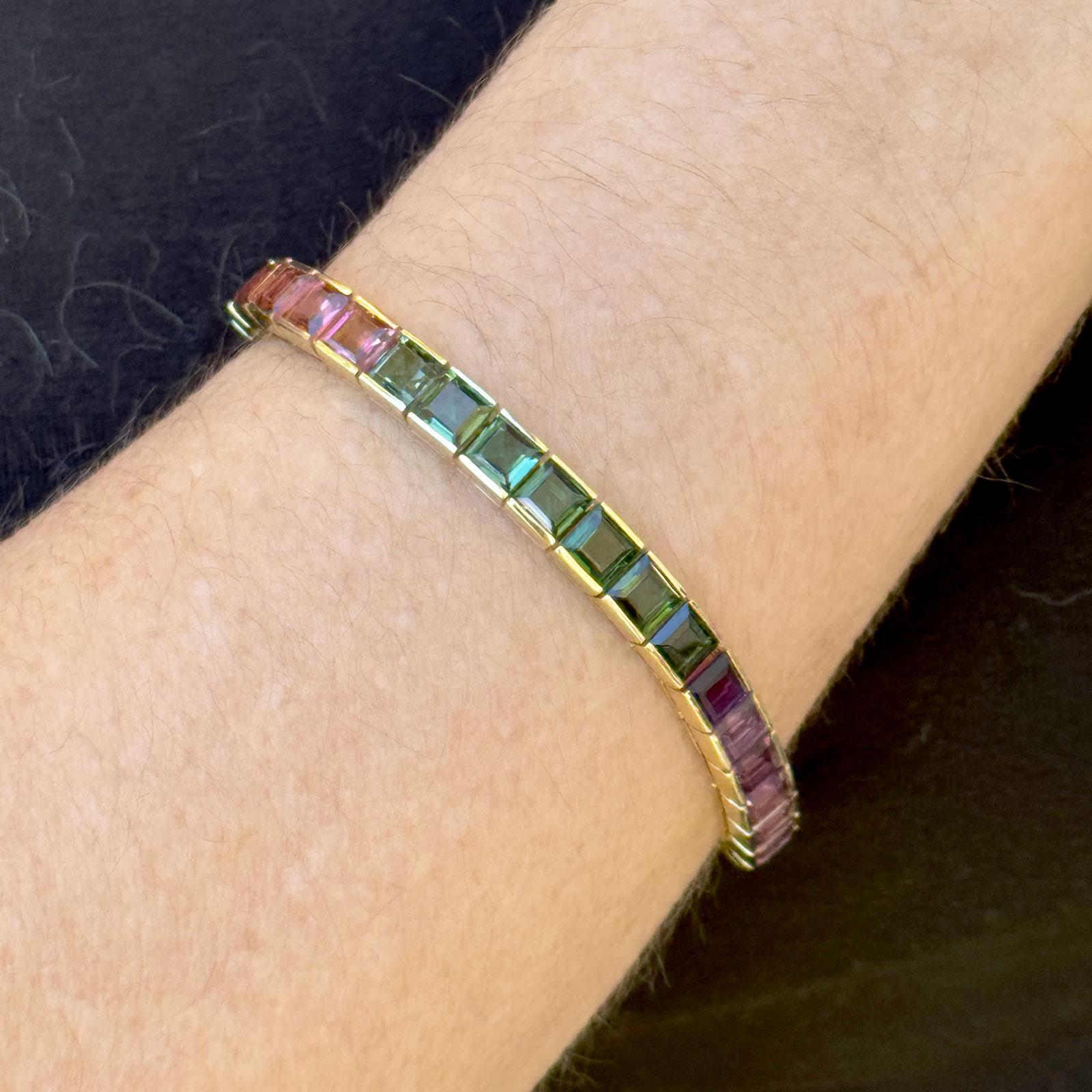 This exquisite H. Stern Rainbow Gemstone Bracelet, crafted in 18k yellow gold, radiates vibrant sophistication with its array of 36 carefully selected gemstones. Featuring pink tourmaline, citrine, green tourmaline, blue topaz, and amethyst, the