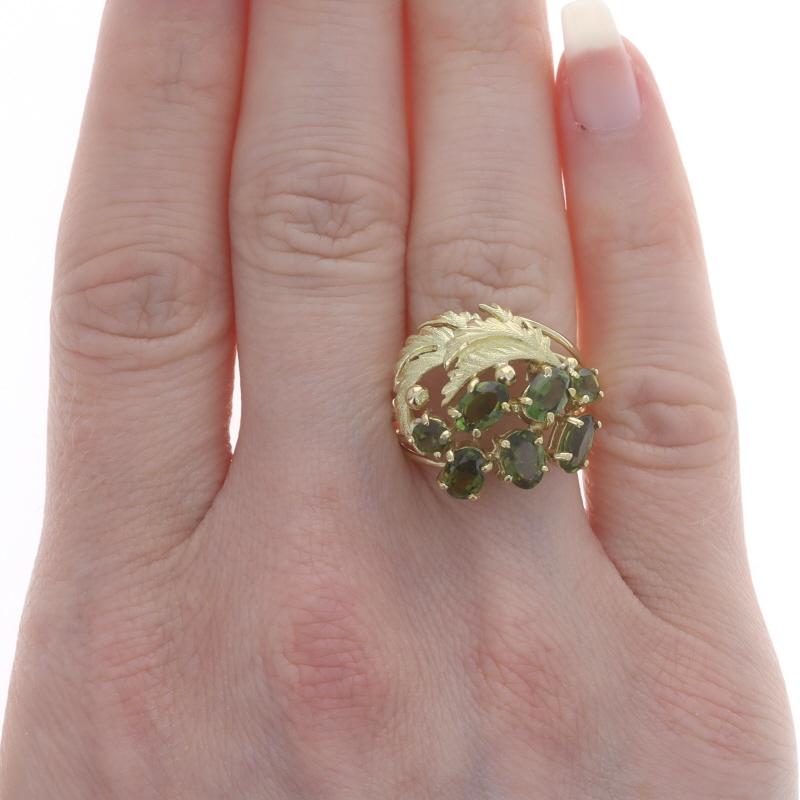 Size: 7 1/4
Sizing Fee: Up 2 sizes for $50 or Down 1 size for $30

Brand: H. Stern
Era: Vintage

Metal Content: 18k Yellow Gold

Stone Information
Natural Tourmalines
Carat(s): 2.85ctw
Cut: Oval & Round
Color: Green

Total Carats: 2.85ctw

Style: