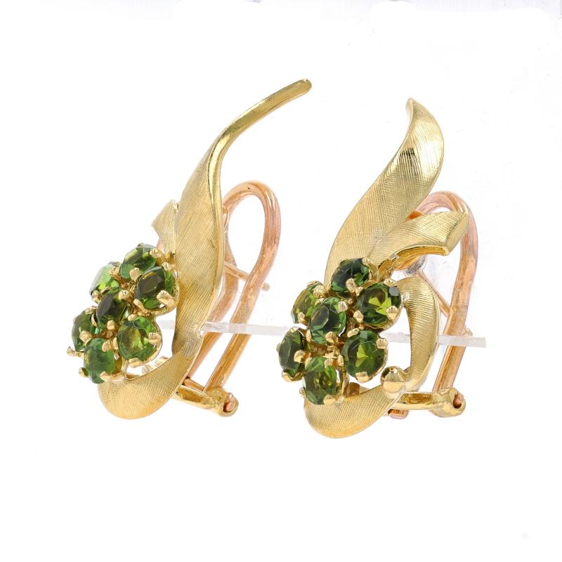 Brand: H. Stern
Era: Vintage

Metal Content: 18k Yellow Gold

Stone Information
Natural Tourmalines
Carat(s): 2.52ctw
Cut: Round
Color: Green

Total Carats: 2.52ctw

Style: Large Stud
Fastening Type: Omega Closures
Features: Smoothly Finished with