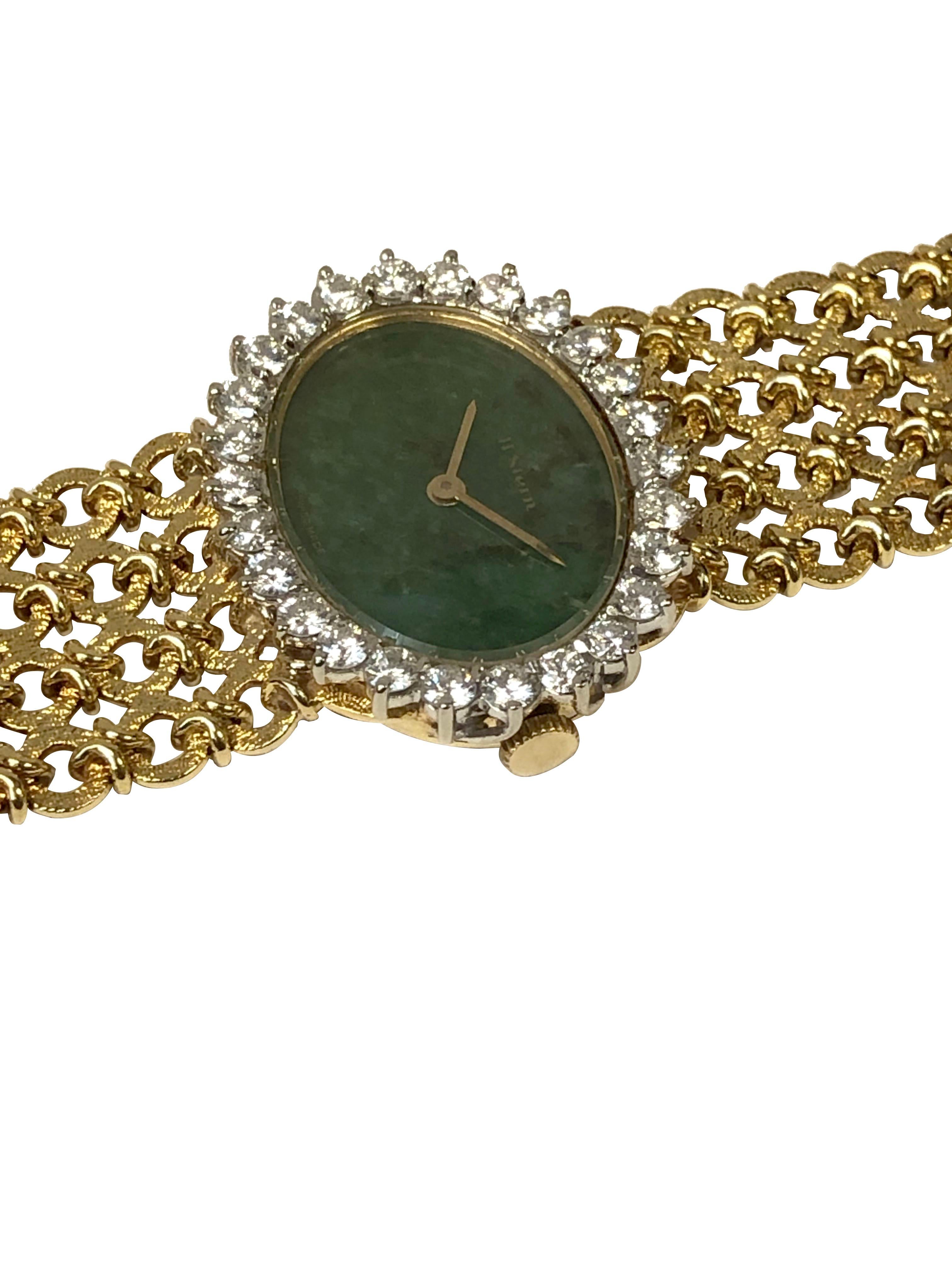 Circa 1970s H. Stern Ladies Wrist Watch, 30 x 25 M.M. 18k Yellow Gold 2 piece case, Diamond set Bezel of Round Brilliant cuts of Fine Color and Clarity totaling approximately 1 Carat. Nephrite stone dial, 17 jewel mechanical, manual wind movement.