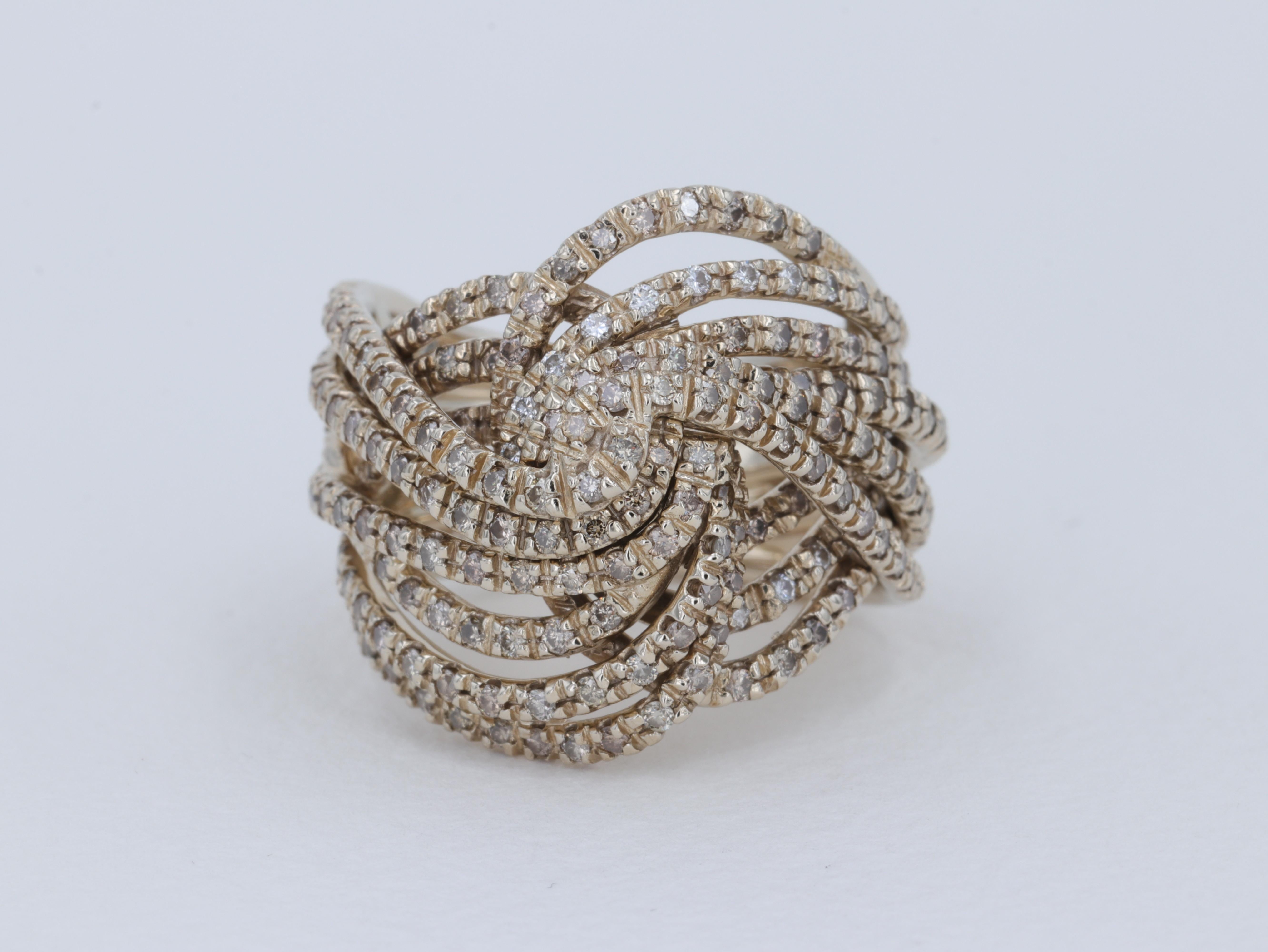 An iconic collection by H Stern the Zephyr ring features multiple rows of 18 karat 