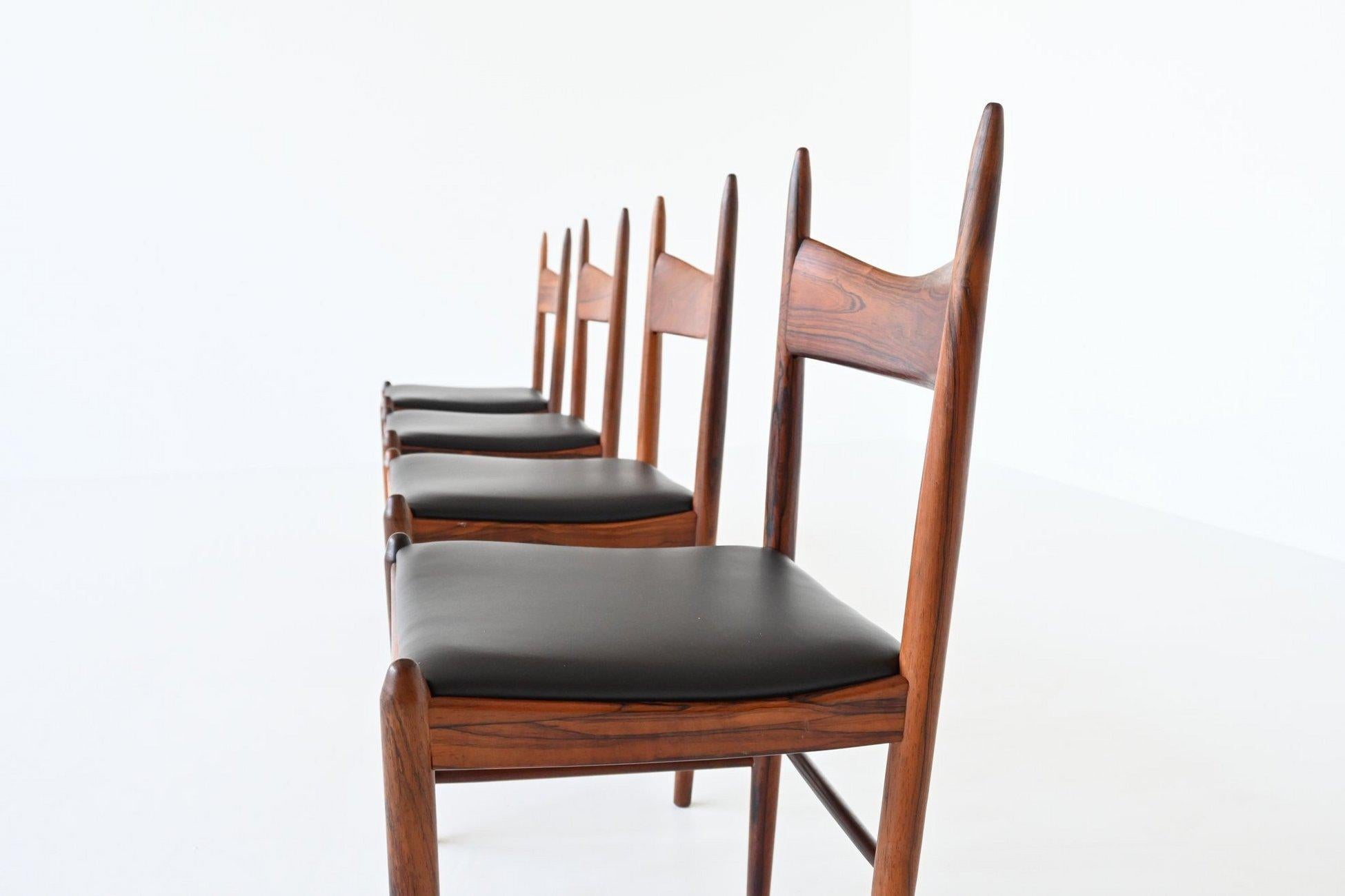 Impresionante juego de cuatro sillas de comedor diseñado por H. Vestervig Eriksen para Brdr. Tromborg, Dinamarca 1960. Estas sillas de formas asombrosas están hechas de precioso palisandro brasileño macizo veteado y los asientos están tapizados con