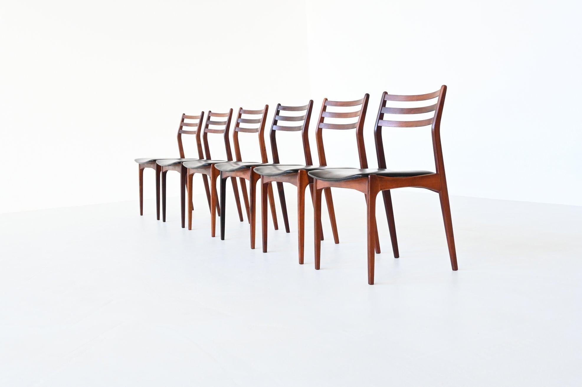 Fantastic set of six dining chairs designed by H. Vestervig Eriksen for Brdr. Tromborg, Denmark 1960. These nicely shaped chairs are made of beautiful grained solid Brazilian rosewood and the seats are upholstered with original black faux leather.