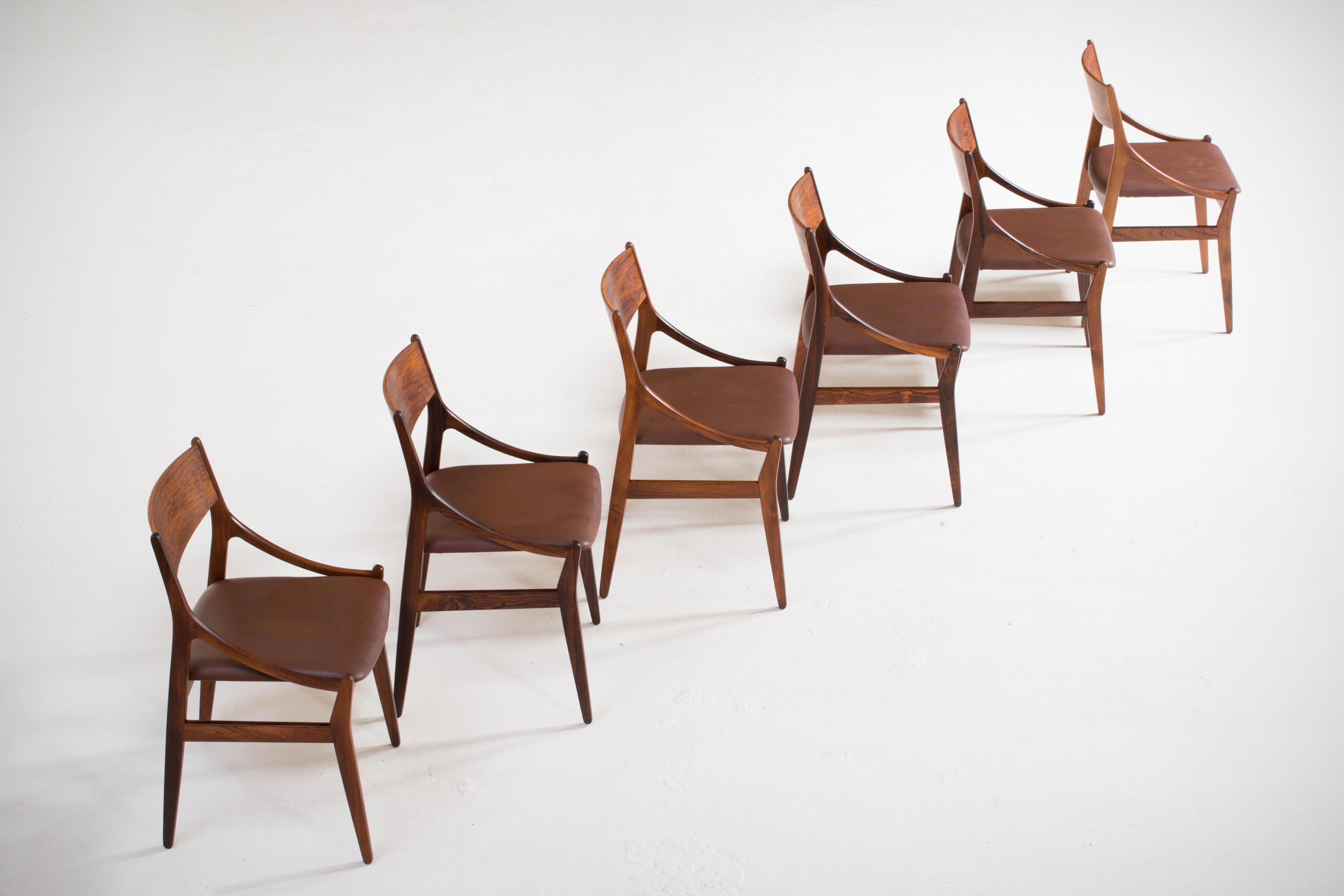 Vestervig Eriksen set of six dining chairs in partly solid rosewood.

Seats new upholstered with tan vintage aniline leather.

Made by Brdr. Tromborg’s Eftf., Møbelfabrik Vestervig Eriksen Aarhus.