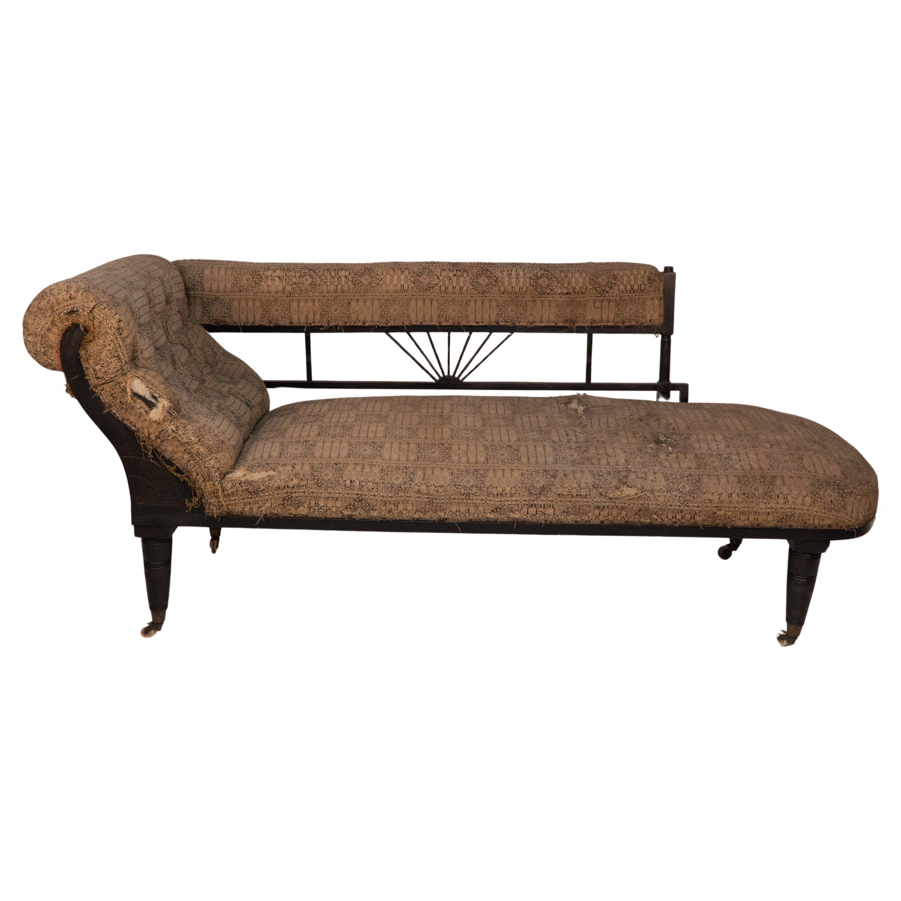 H W Batley (attributed). An Anglo-Japanese ebonized chaise lounge or day bed
