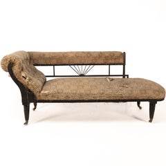 H W Batley (attributed). An Anglo-Japanese ebonized chaise lounge or day bed