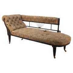 H W Batley (attributed). An Anglo-Japanese ebonized chaise lounge or day bed