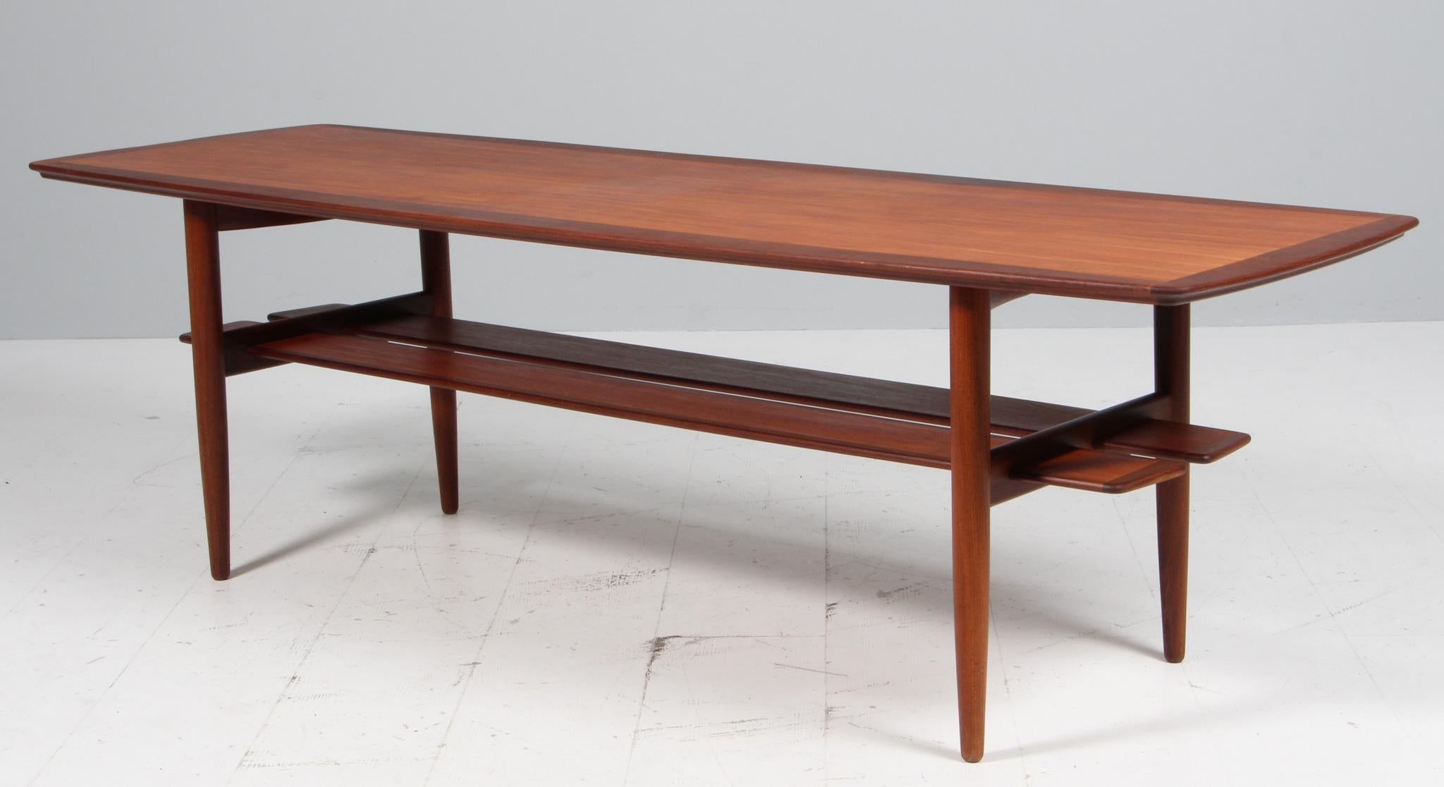 H. W. Klein round coffee table in partly solid teak

Made by Bramin 