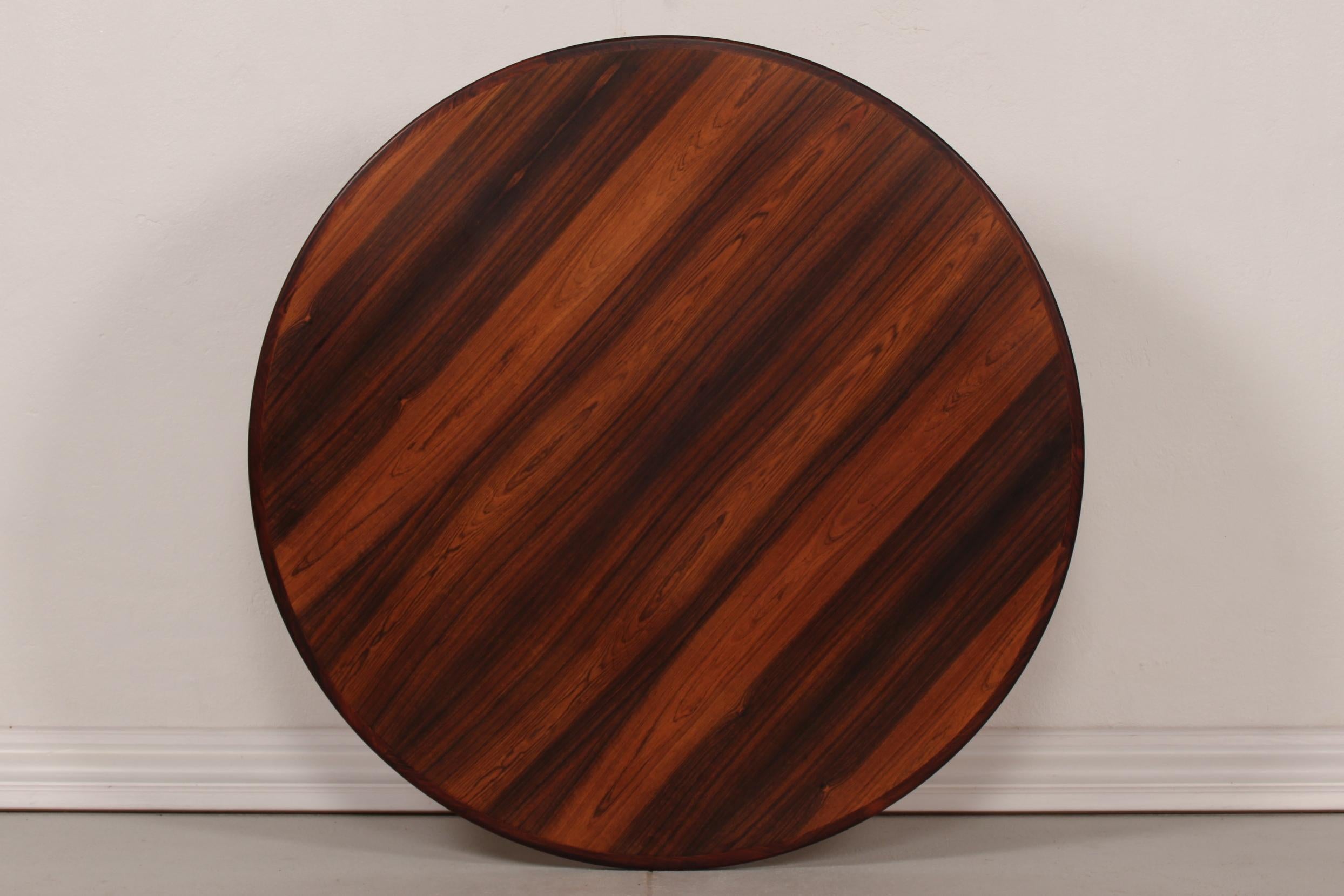 H. W. Klein round coffee table of rosewood with stand of aluminum.
It's made by Bramin Møbler in Denmark in the 1960s.
 