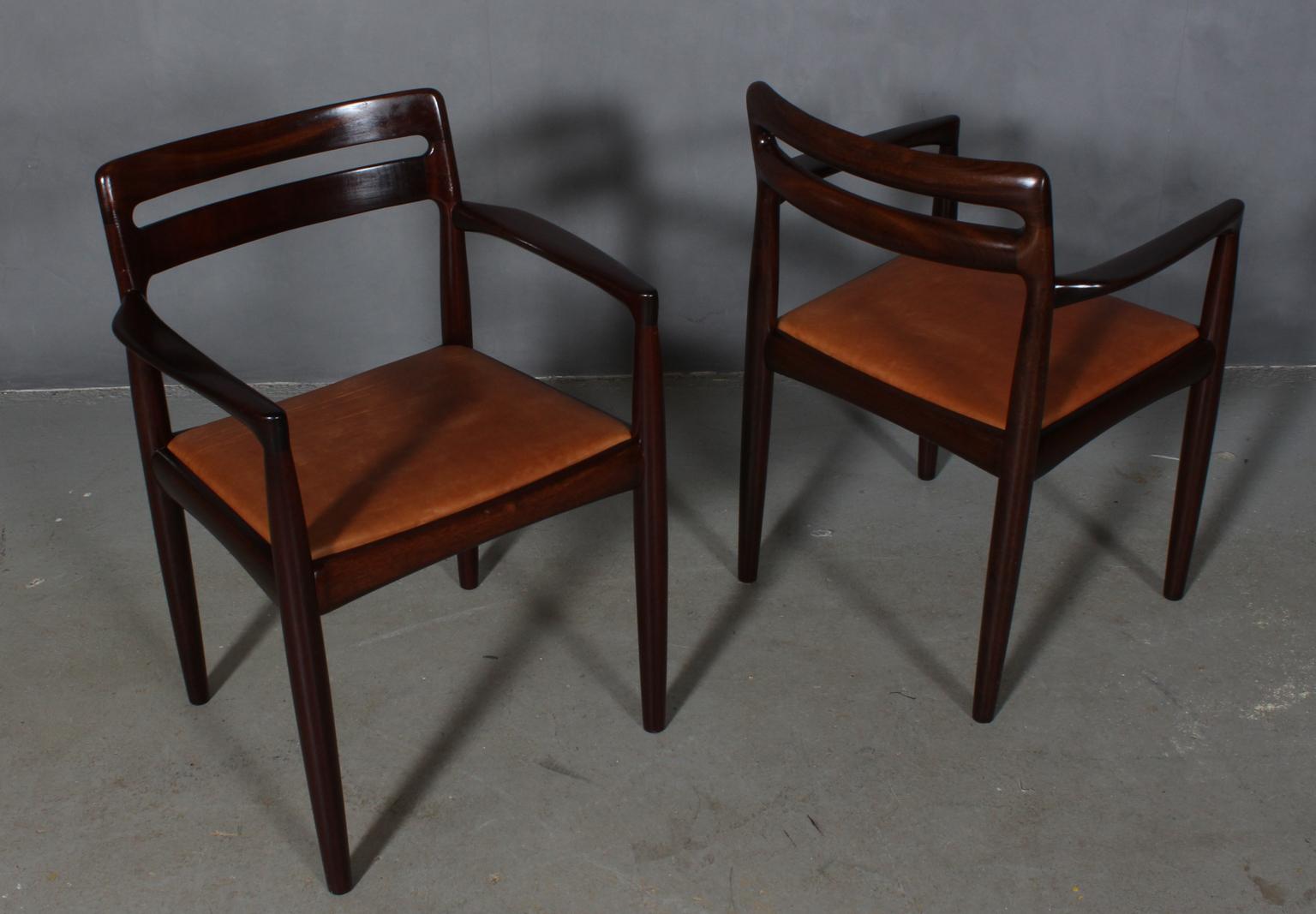 H. W. Klein set of armchairs in mahogany.

New upholstered with vintage tan aniline leather.

Made by Bramin.