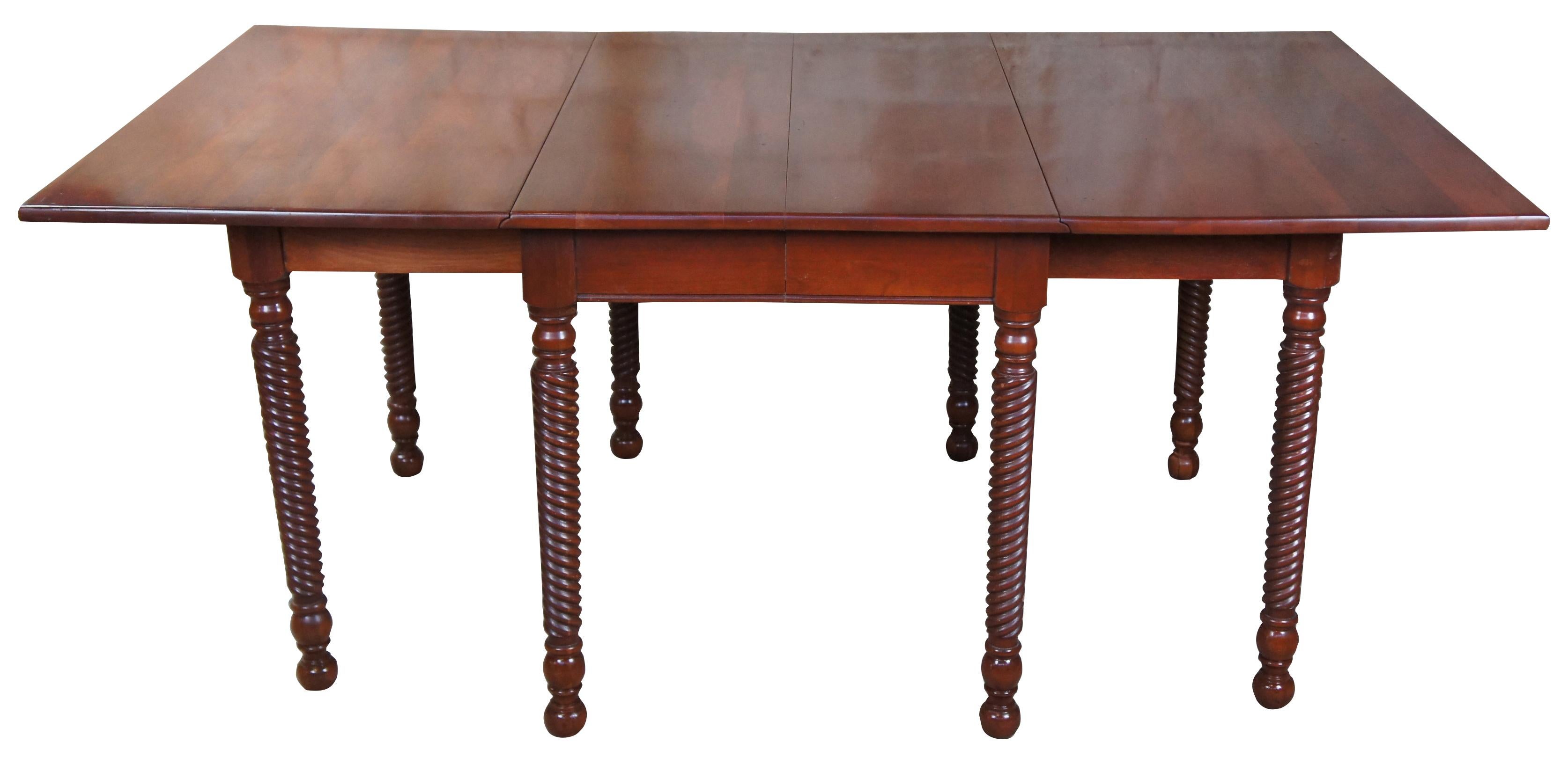 Mid-20th century solid cherry gateleg table by Consider H Willett Inc of Louissville Kentucky. Features tapered barley twisted legs leading to round ball feet. Marked on underside.

Measures: 27.5