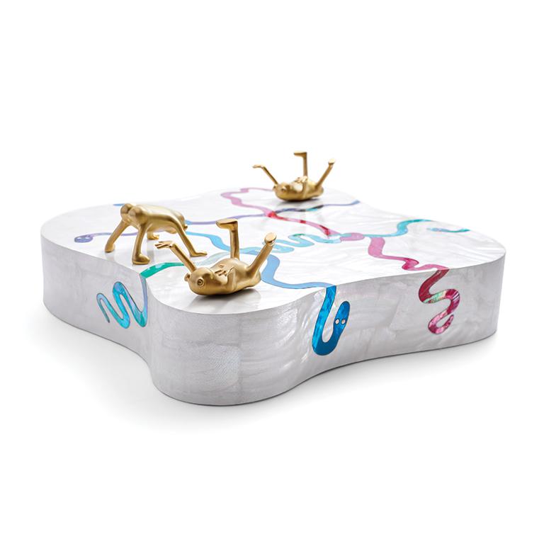 Inspired by rediscovering the joy of being with family and friends, L'OBJET Haas Brothers games facilitate revelry that goes late into the night. Tic-Tac-Toe set crafted from mother of pearl shell with multi-colored shell accents and individually