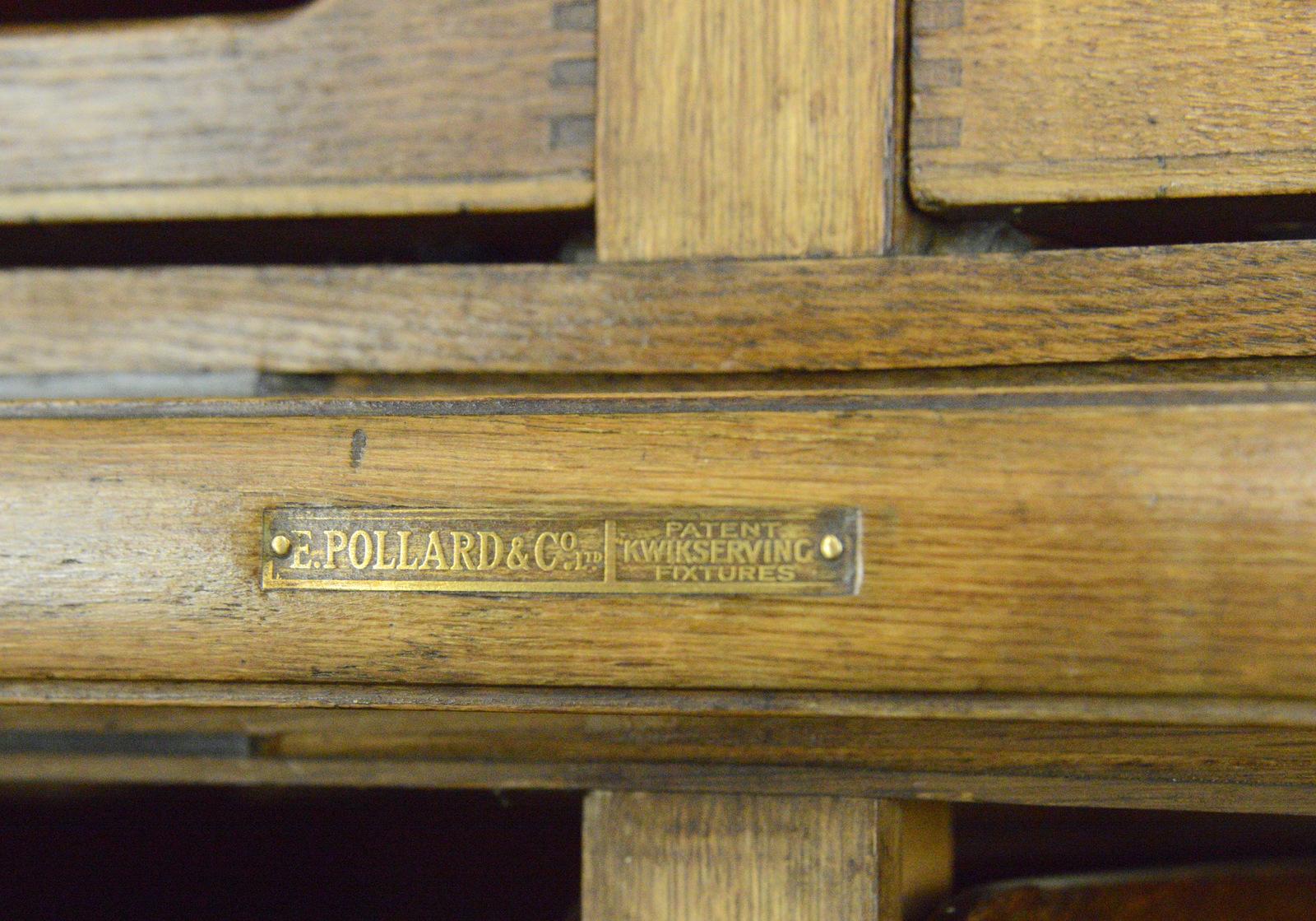Haberdashery cabinet by E Pollard & Co, circa 1910

- Solid oak throughout
- Detailed carved edging
- Paneled sides
- 32 pullout / pull-out drawers
- Original brass makers badge
- Originally commissioned for the Croydon Co-op department