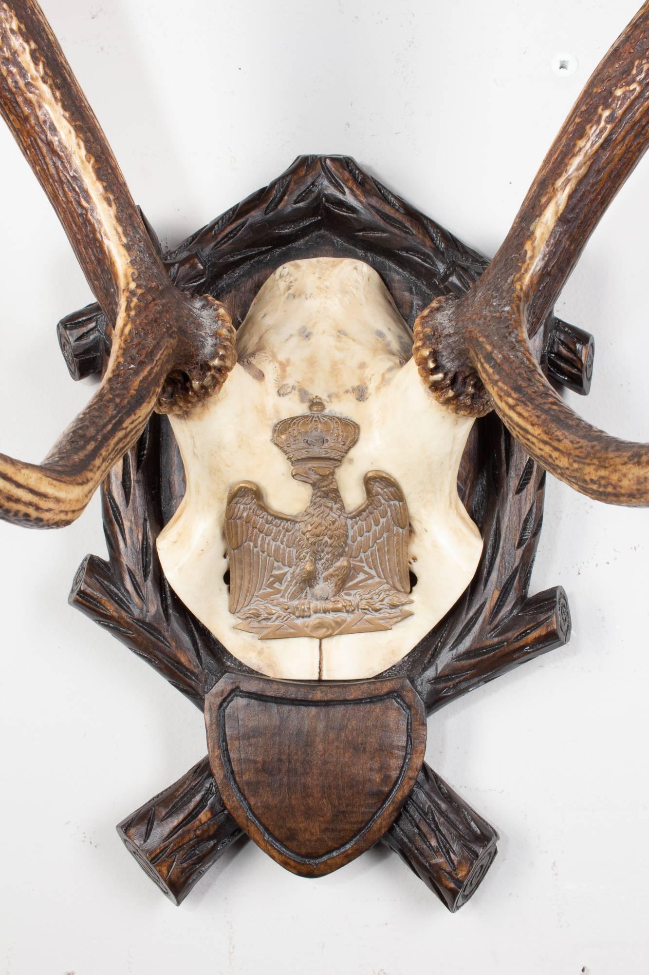 19th century Austrian red stag on original Black Forest carved plaque that hung in Emperor Franz Josef's castle at Eckartsau in the Southern Austrian Alps. Eckartsau was a favorite hunting schloss of the Habsburg family. The plaque itself is an
