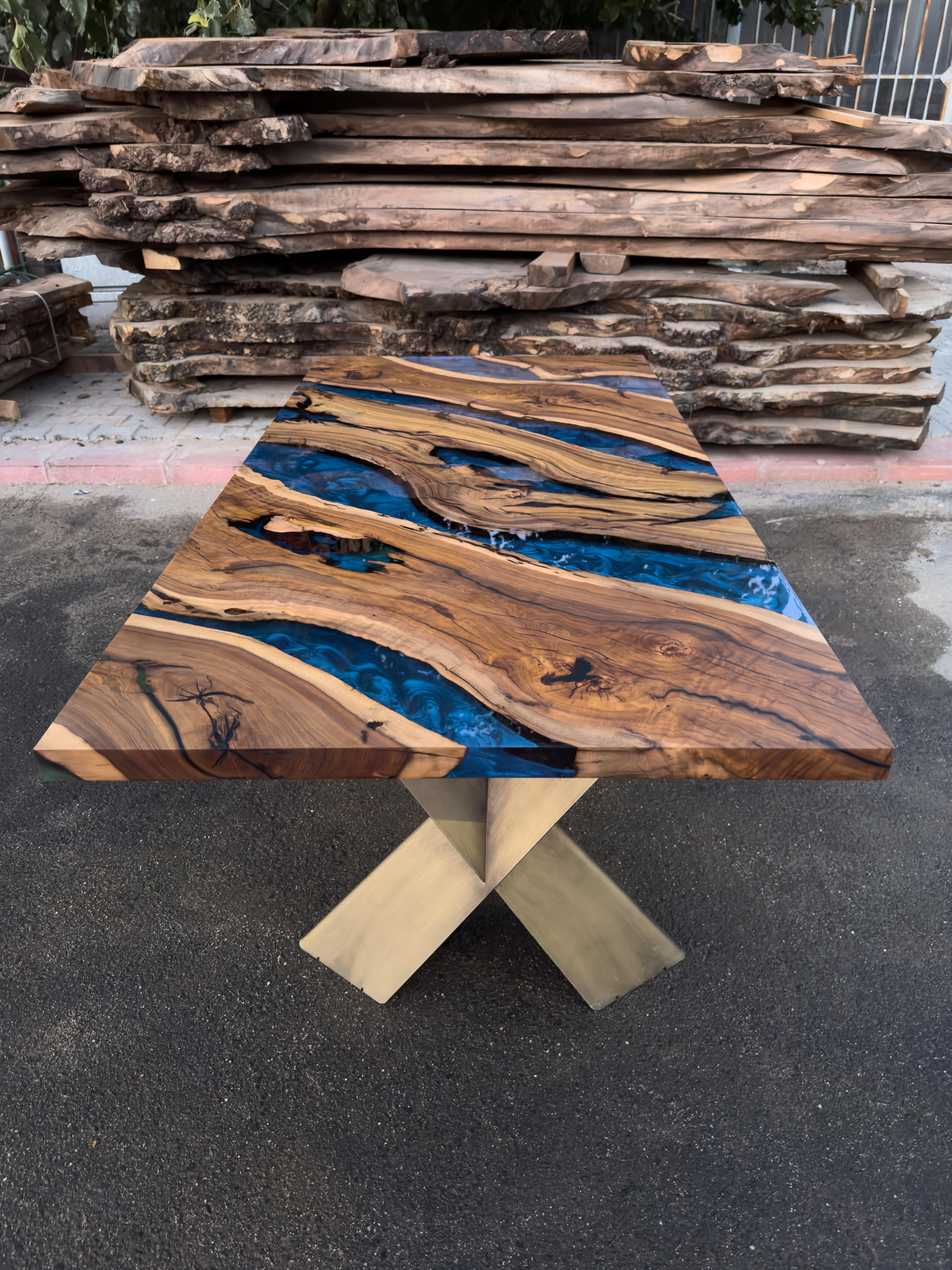 Custom Hackberry Epoxy Table

This stunning table is made of Mediterranean Hackberry wood. The unique beauty of the natural curves of olive wood combined with blue epoxy is seen in this table.

All woods have its own natural shape. Therefore, each